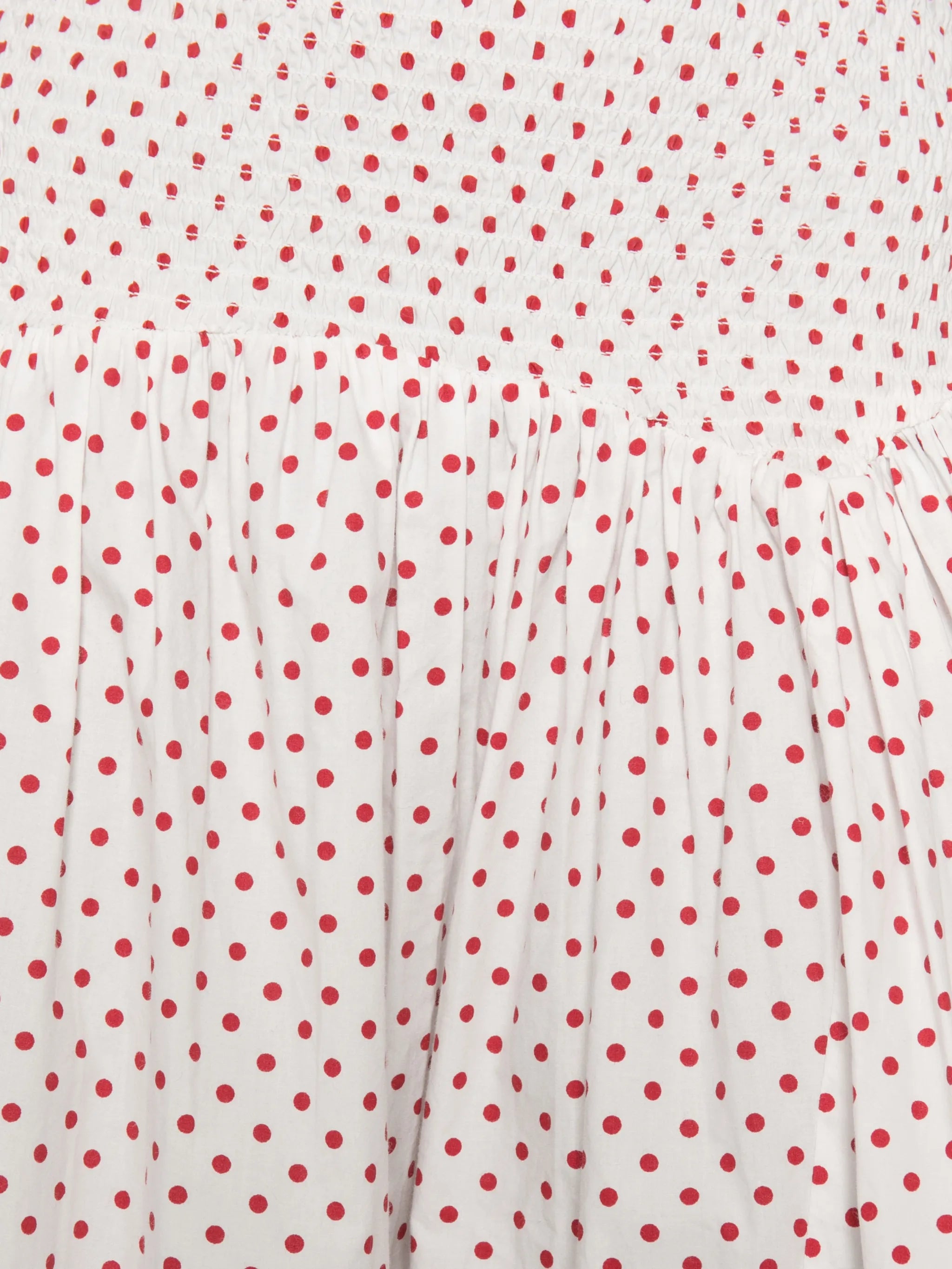 Layla polka-dot smocked midi skirt