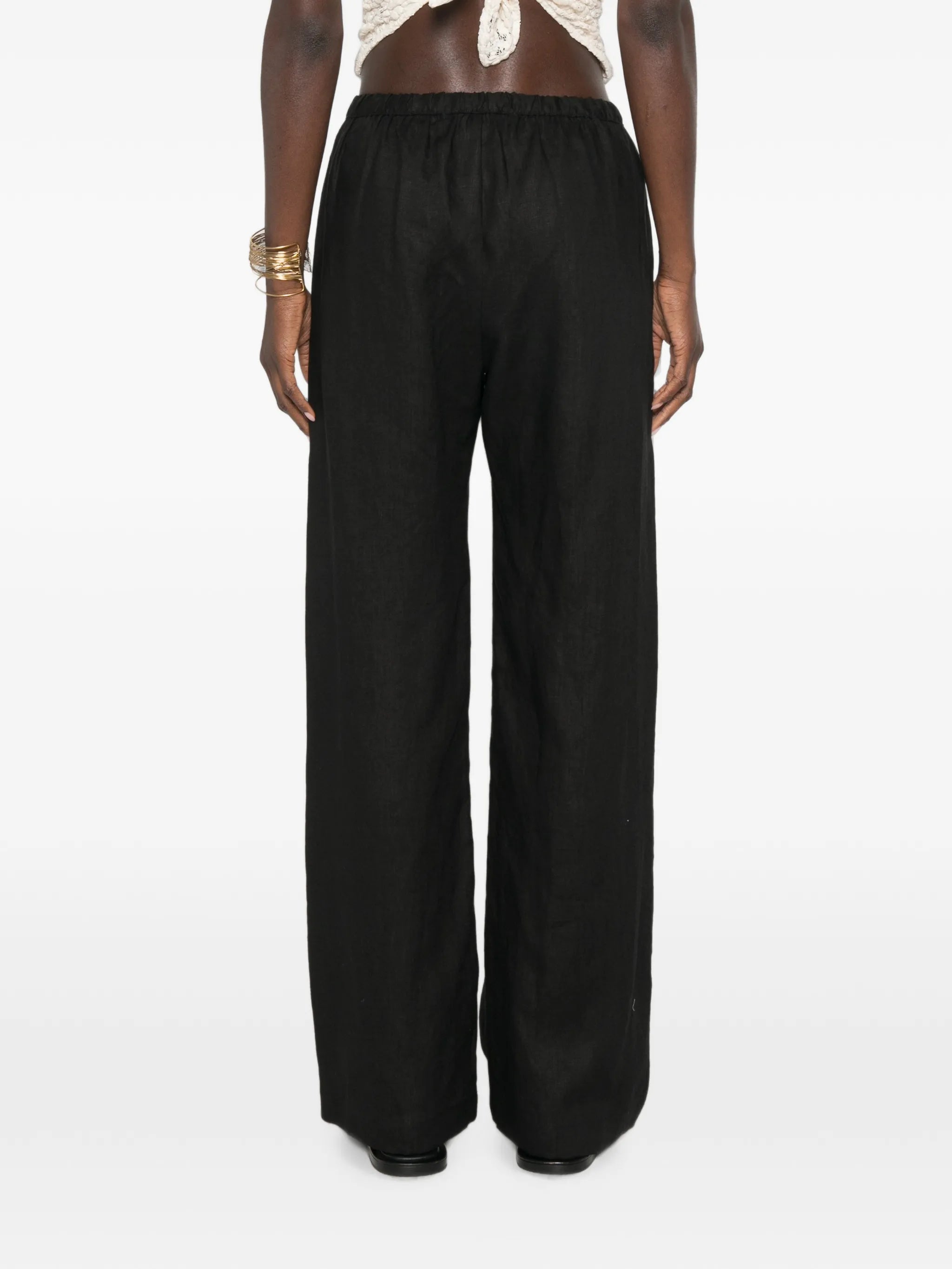 elasticated-waist wide-leg trousers