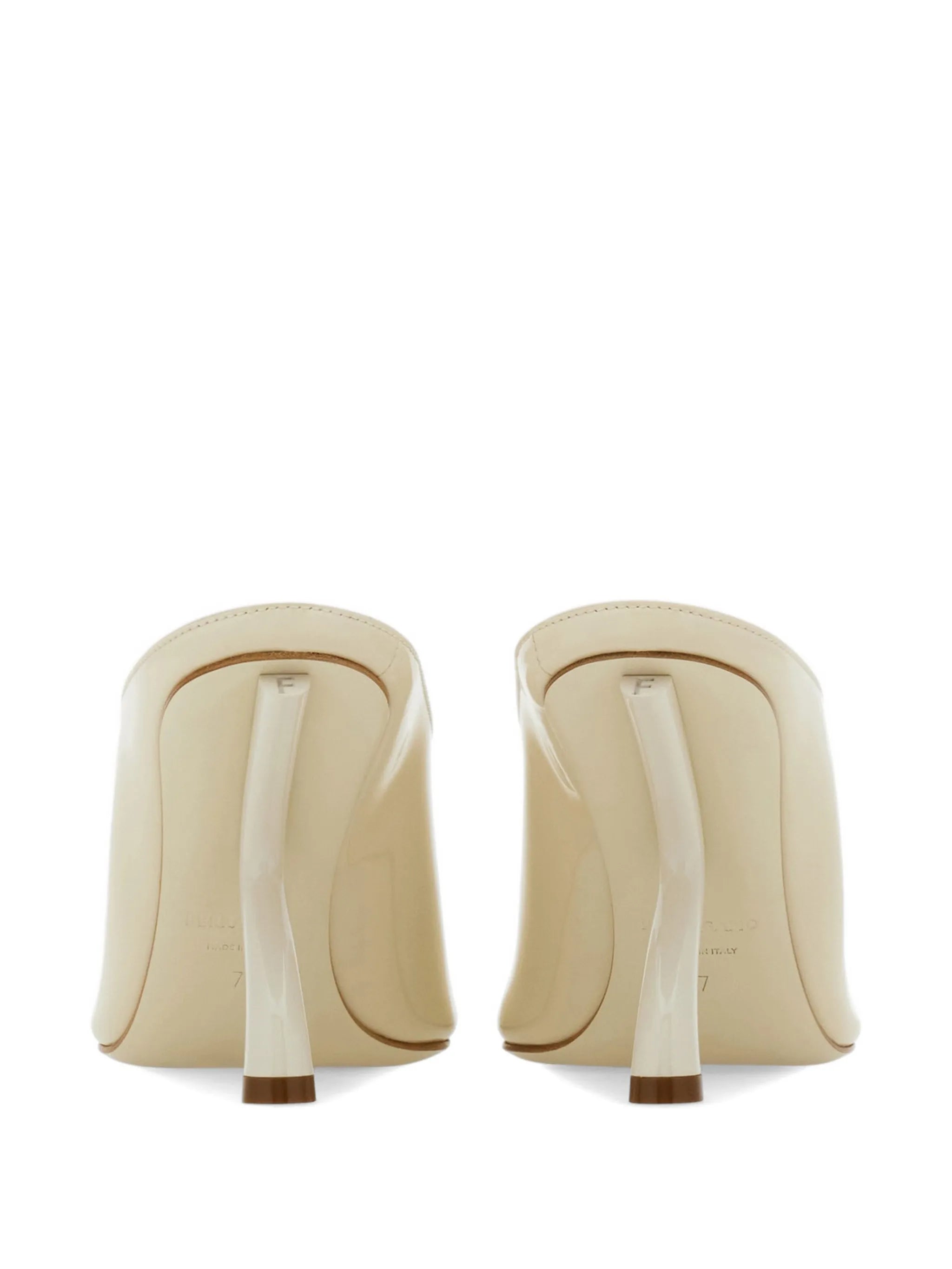 S-shaped heeled mules