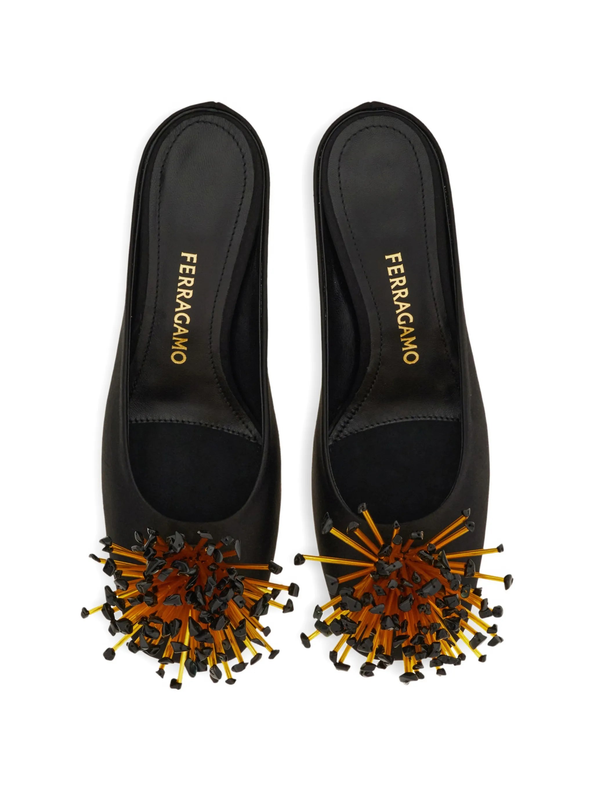 S-shaped heeled mules