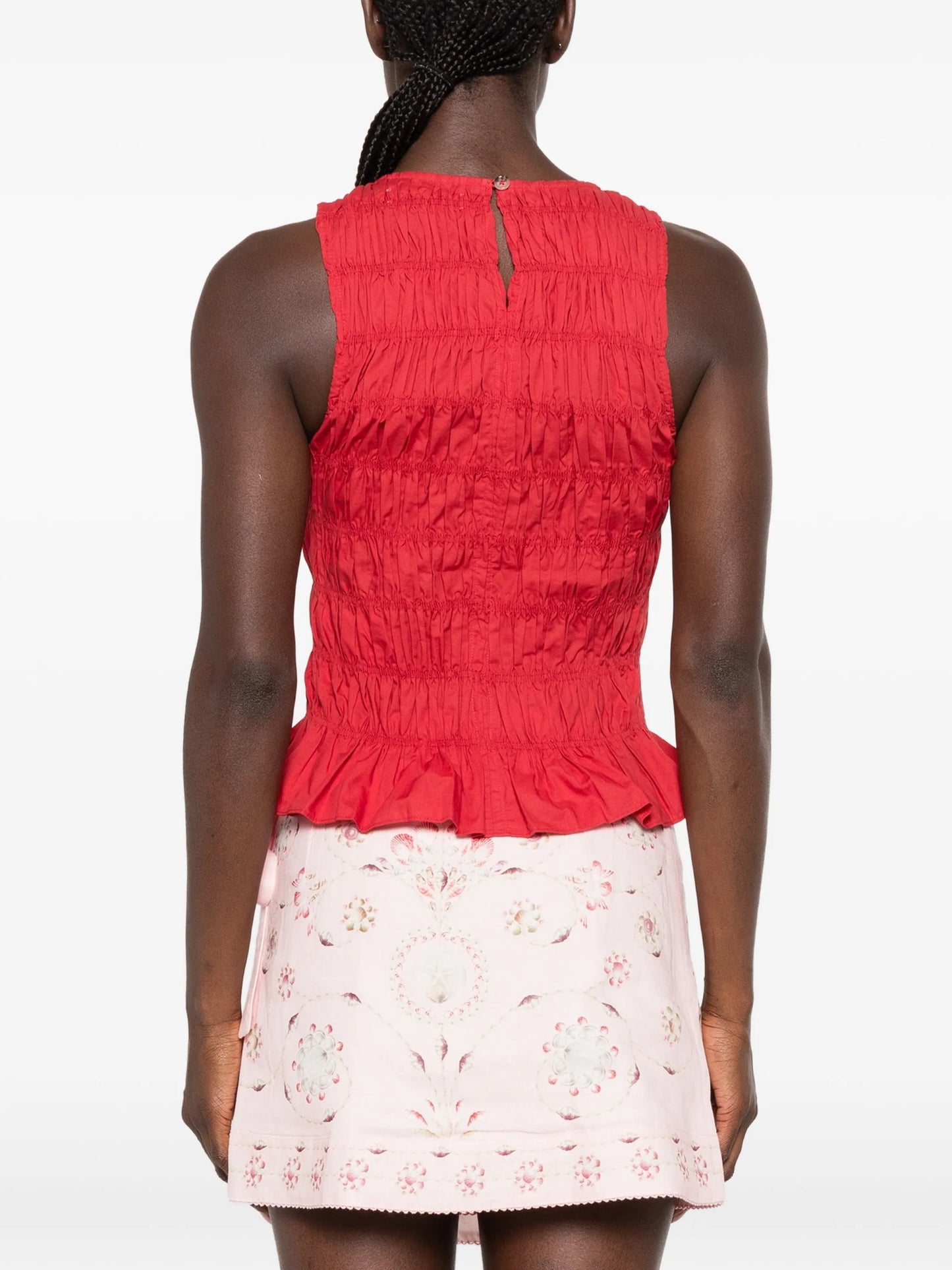 Cales smocked peplum top