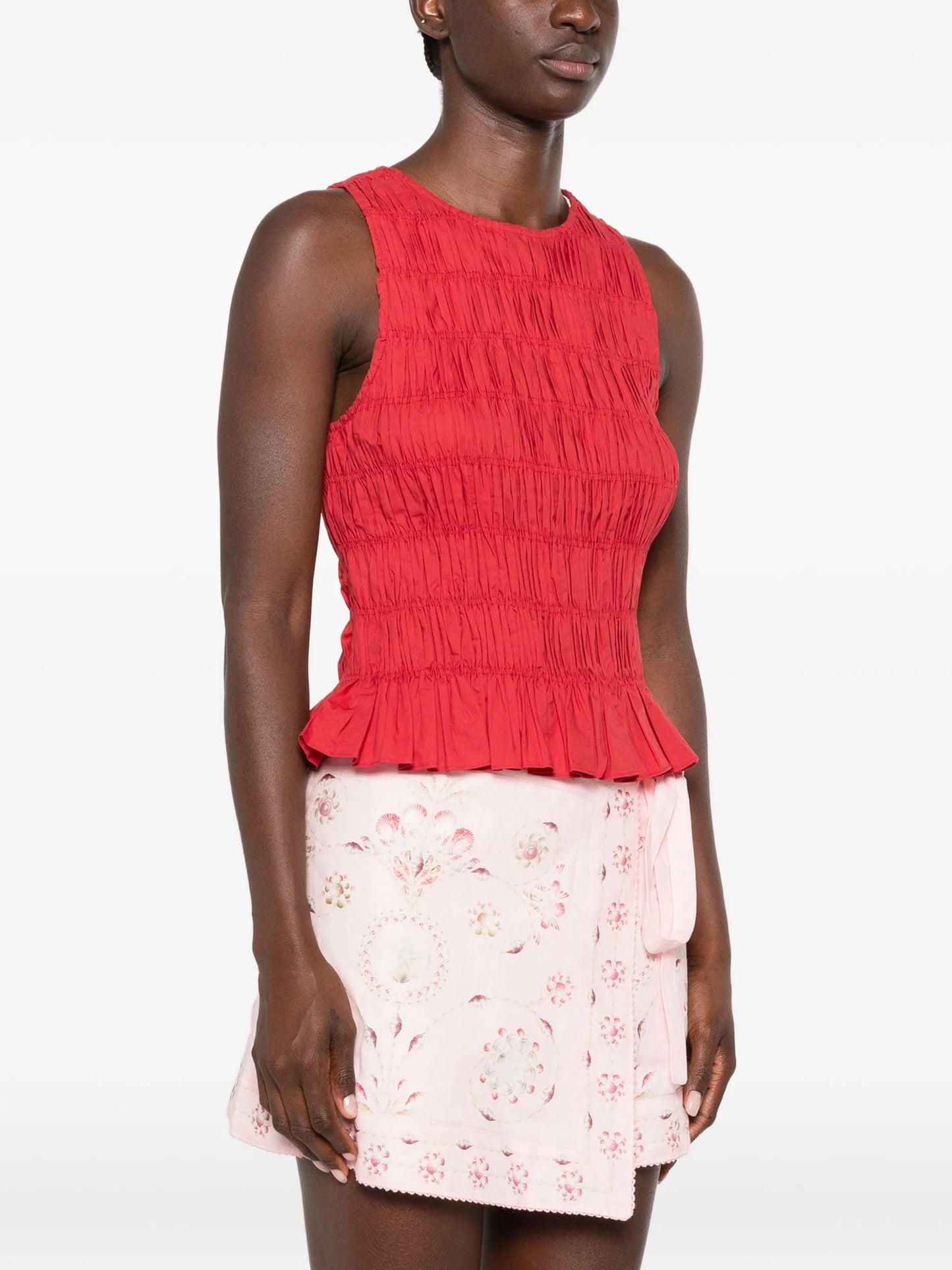 Cales smocked peplum top
