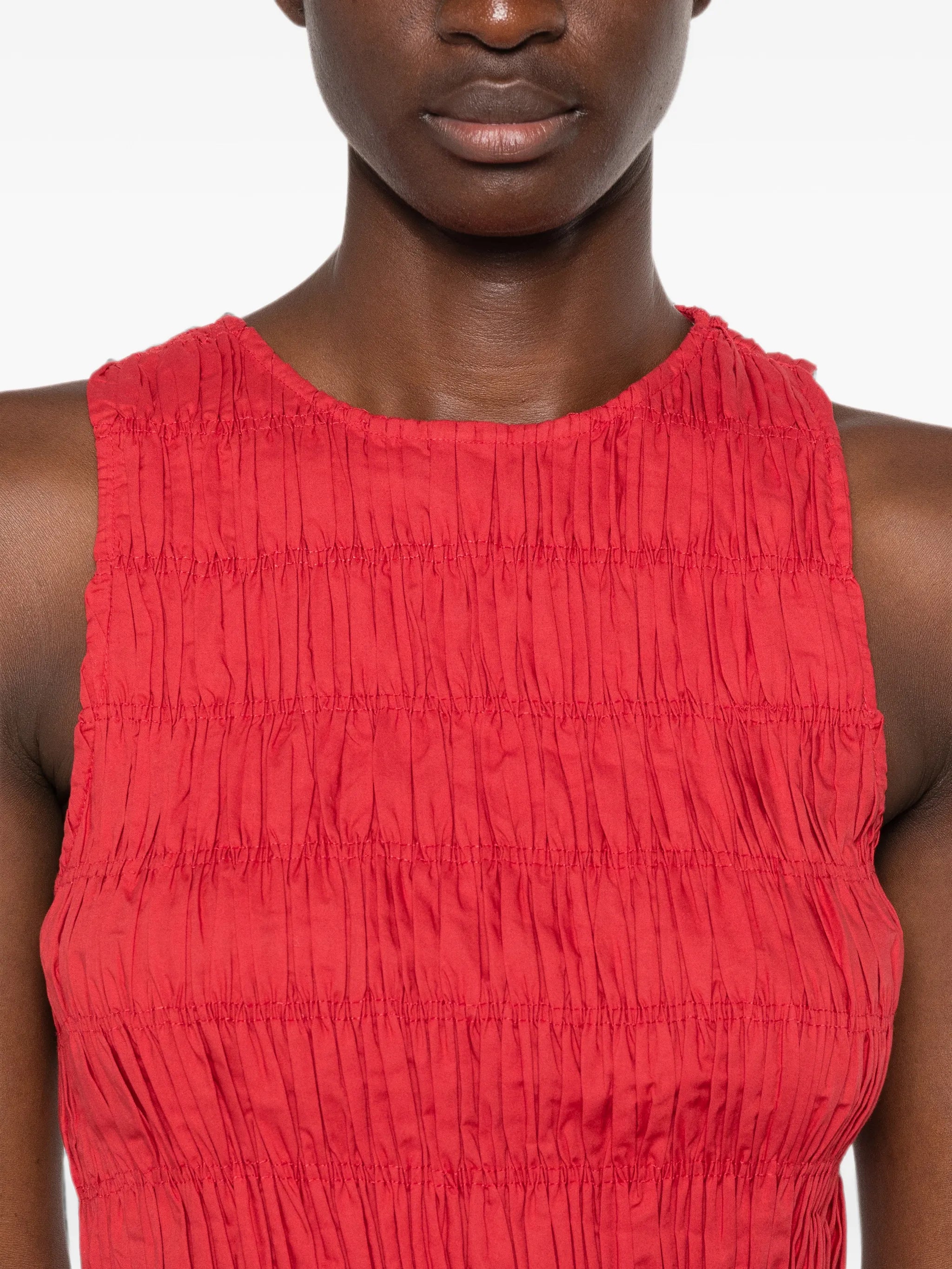 Cales smocked peplum top
