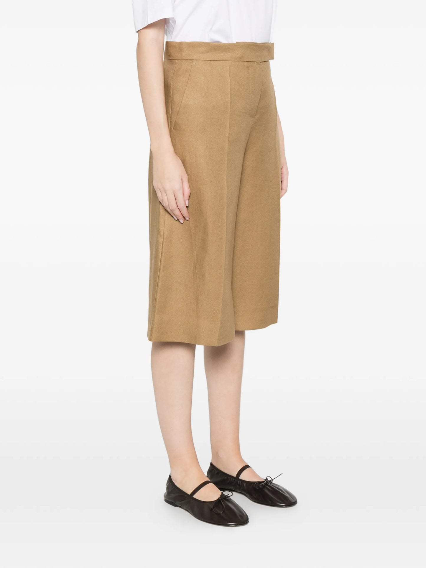high-waisted pleated shorts