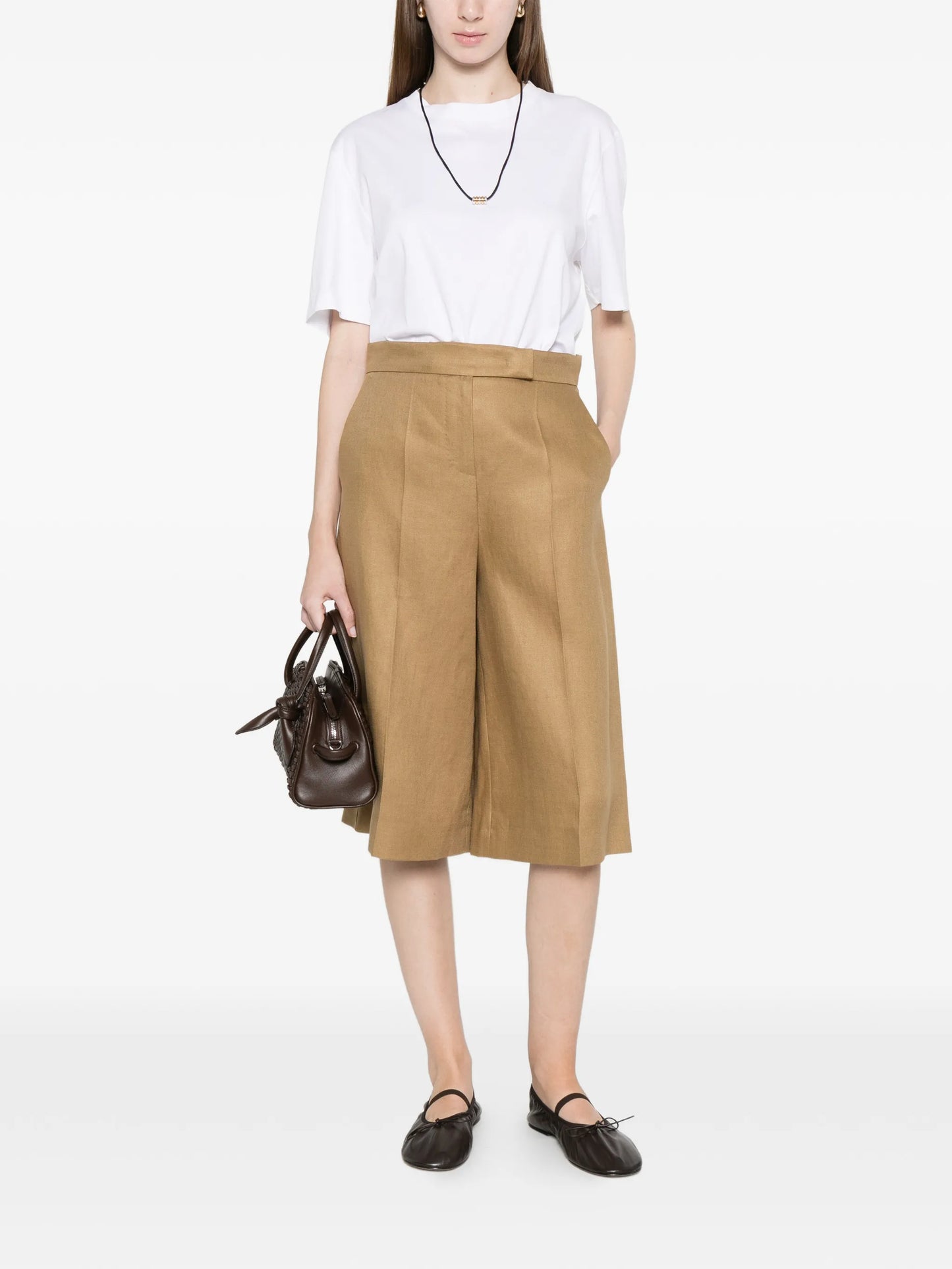 high-waisted pleated shorts