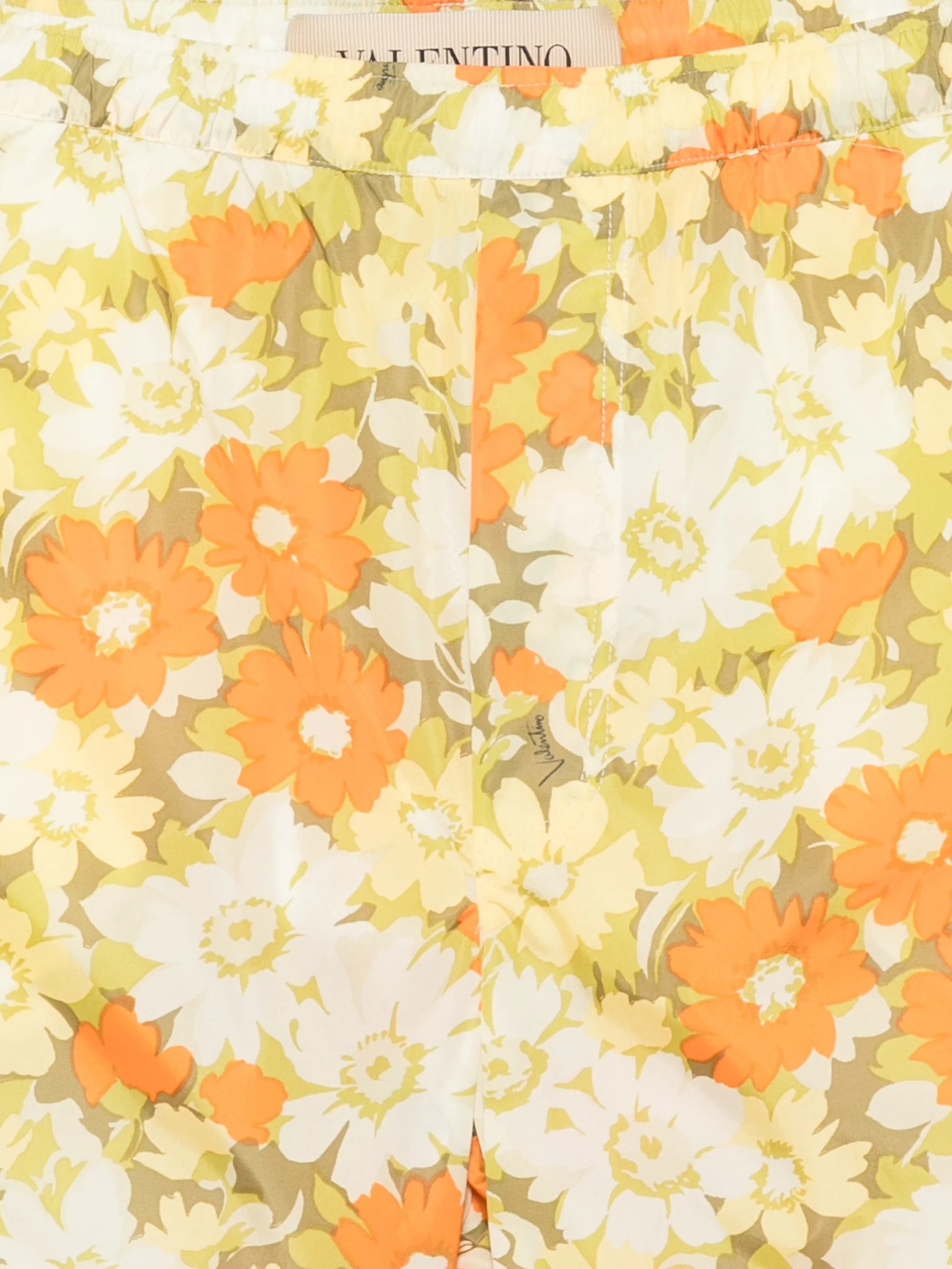 floral-print swimming shorts