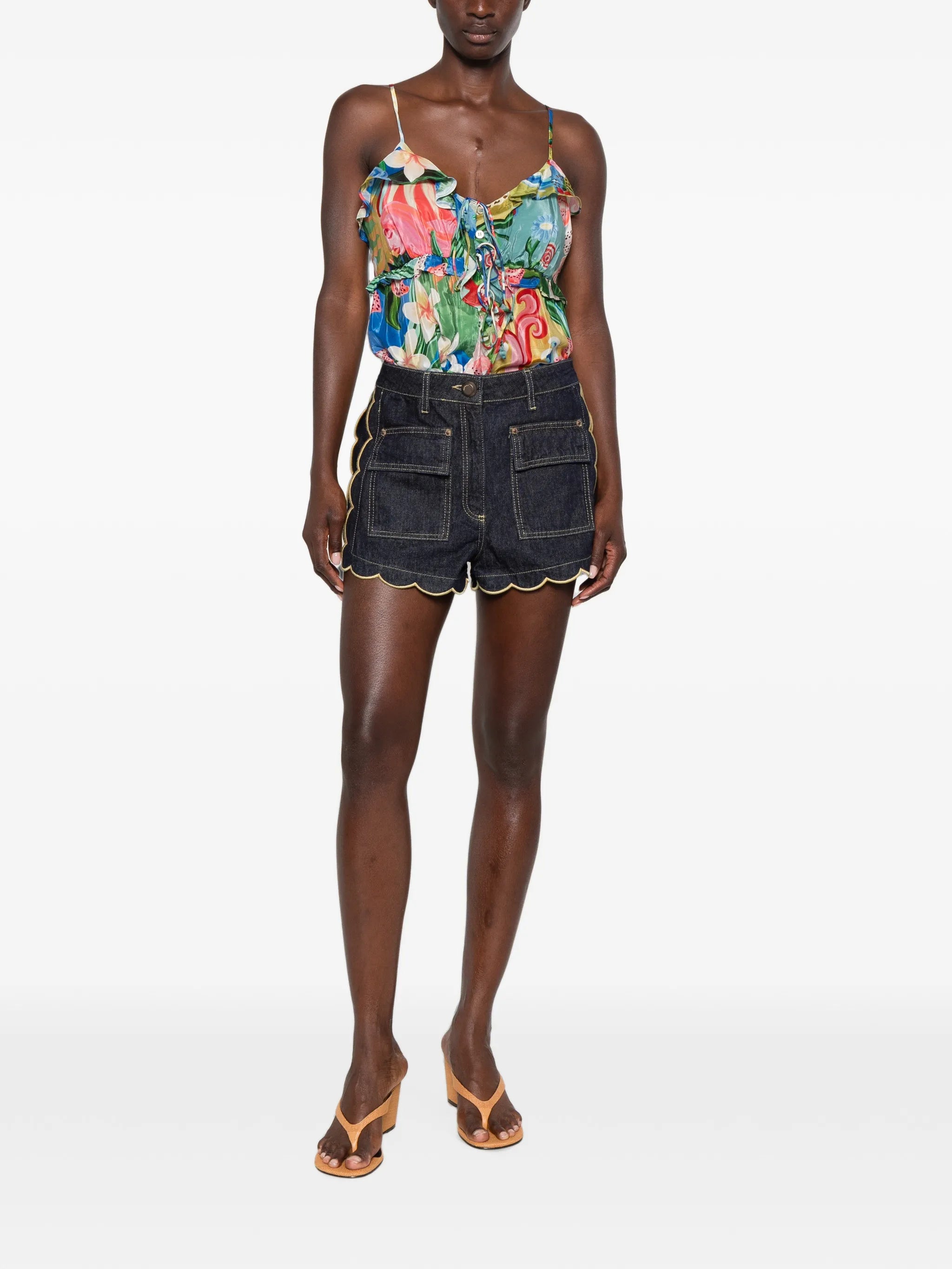 dark denim pockets wavy hem shorts