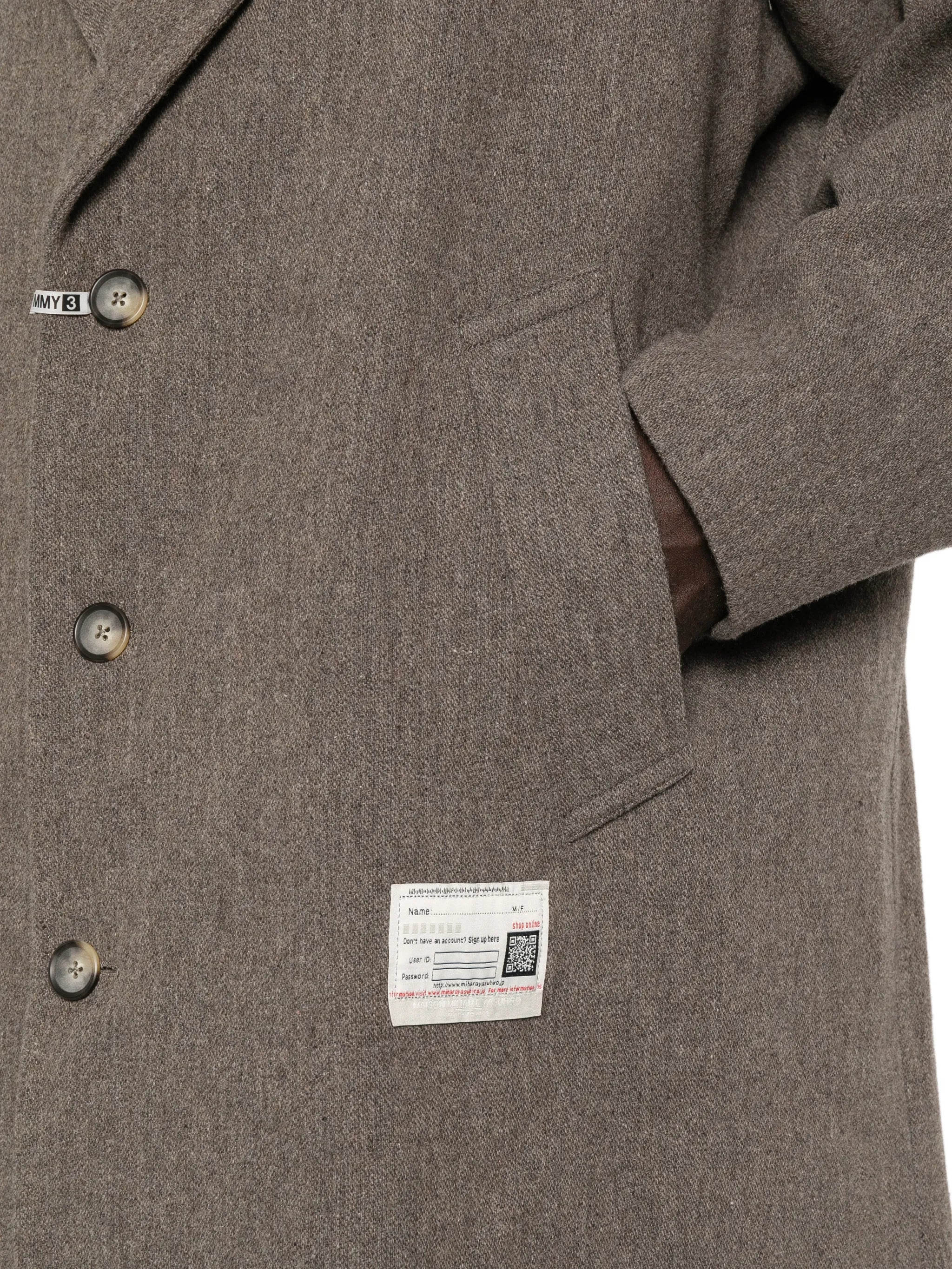 shifted-shoulder overcoat