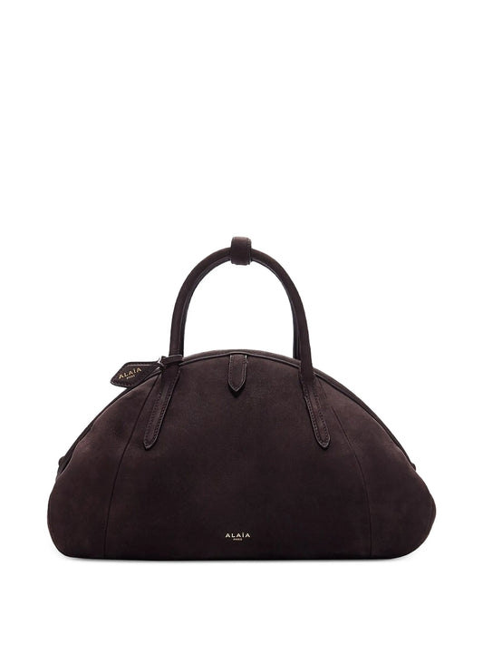 small sculptural leather clutch bag