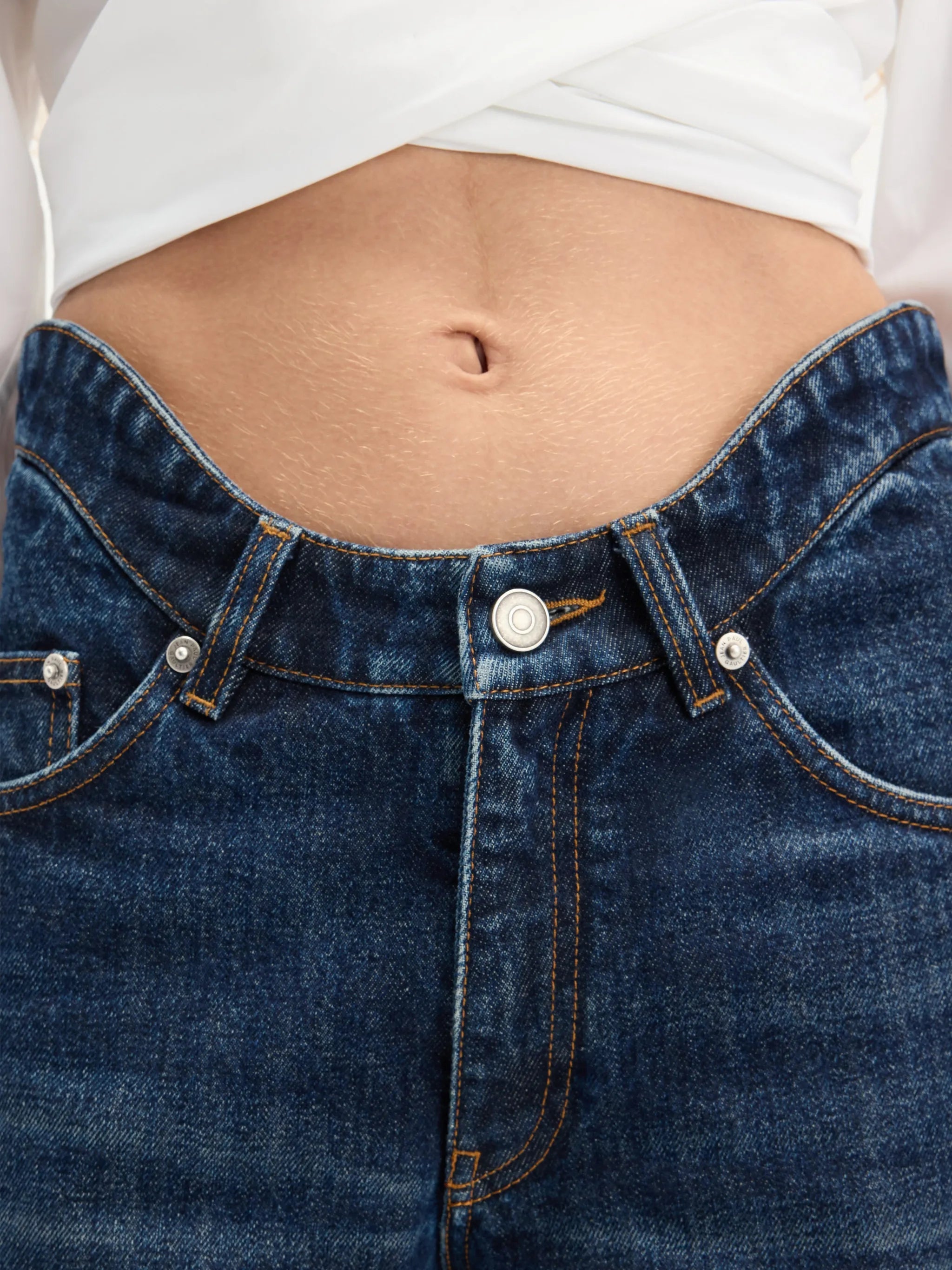 The Curved rounded-waist jeans