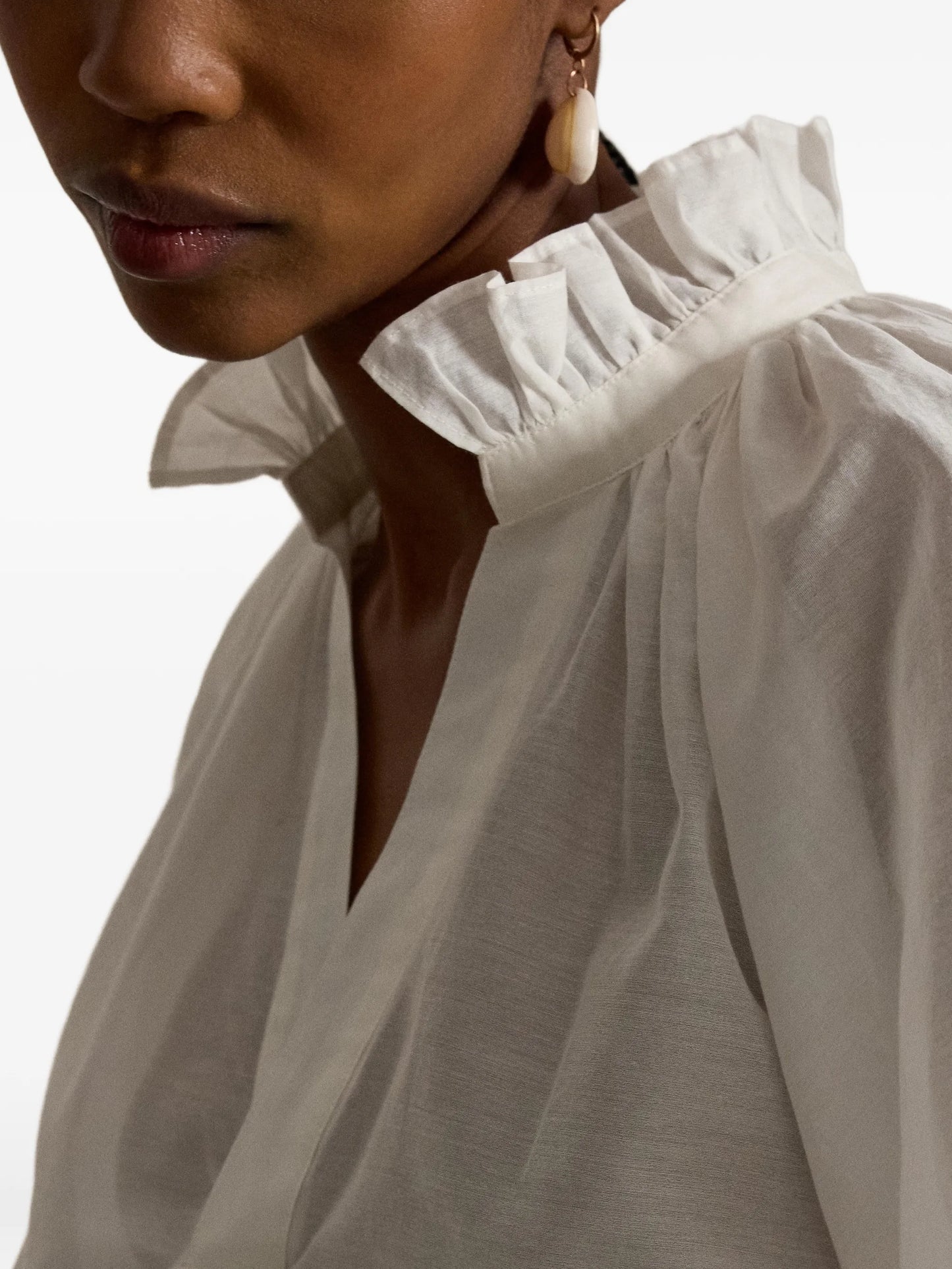 ruffled split-placket blouse