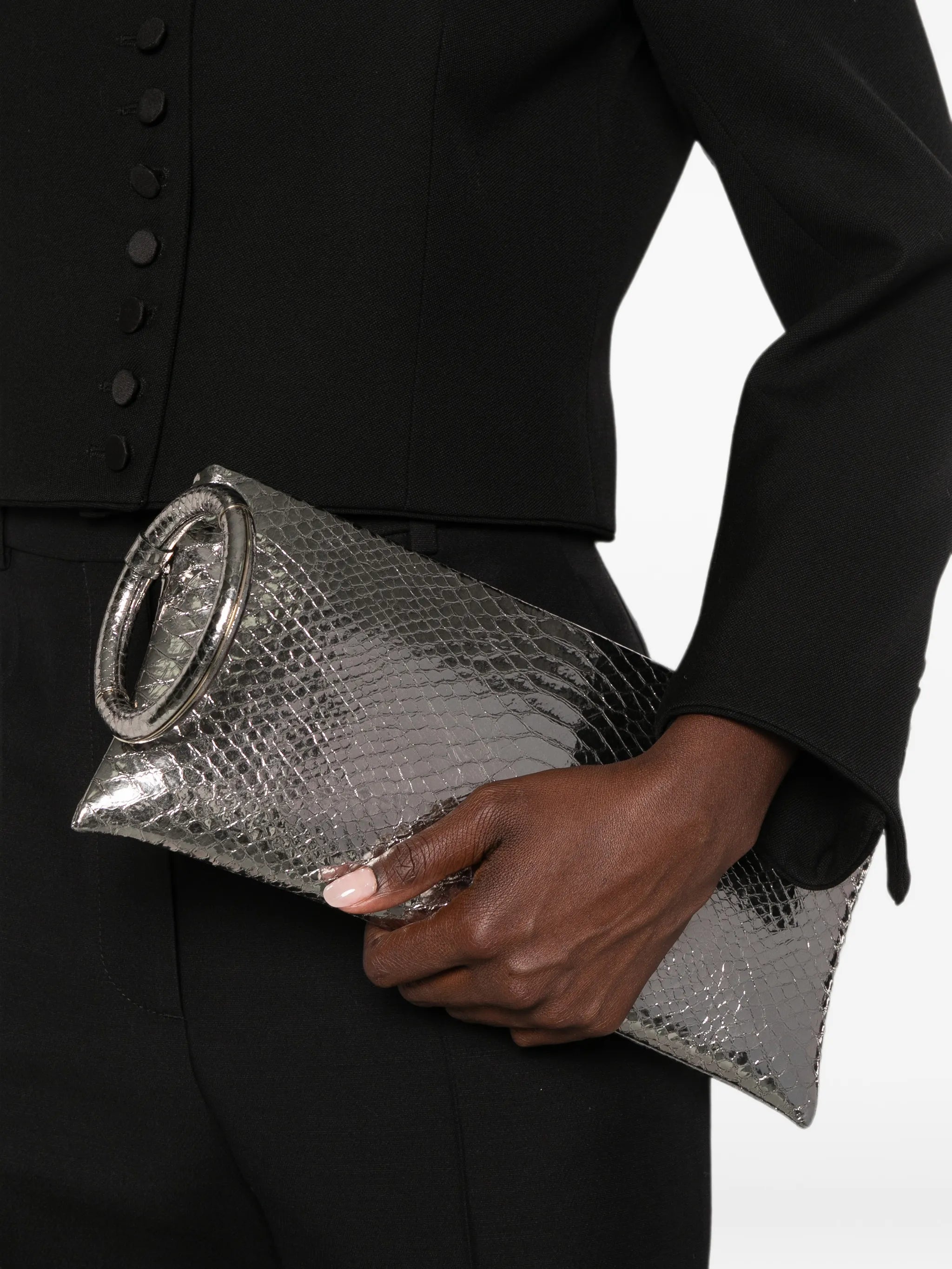 laminated snakeskin-effect clutch bag