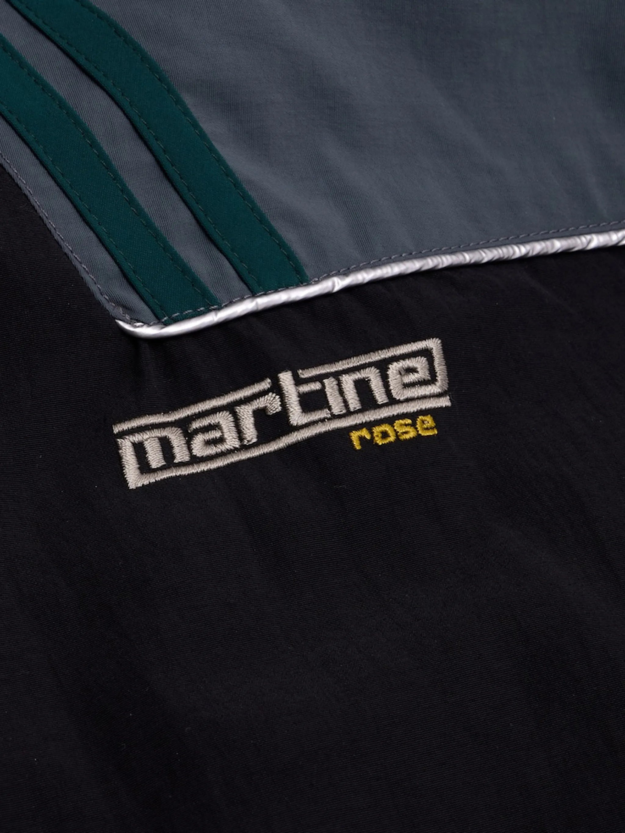 T-lining track jacket in black & teal