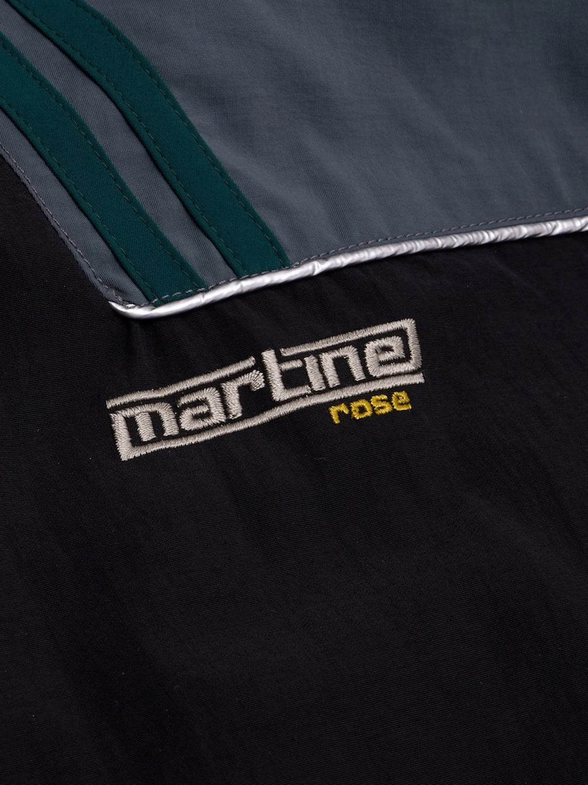 T-lining track jacket in black & teal