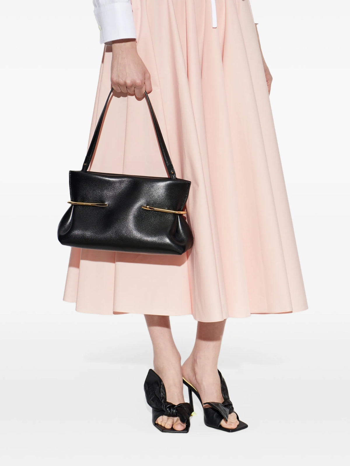 Pinch soft clutch in nappa leather