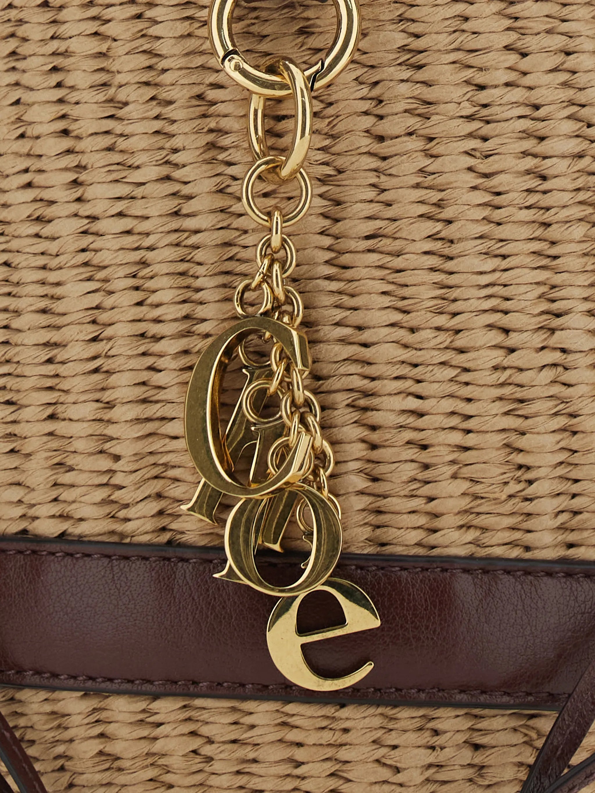 charm-embellished bucket bag