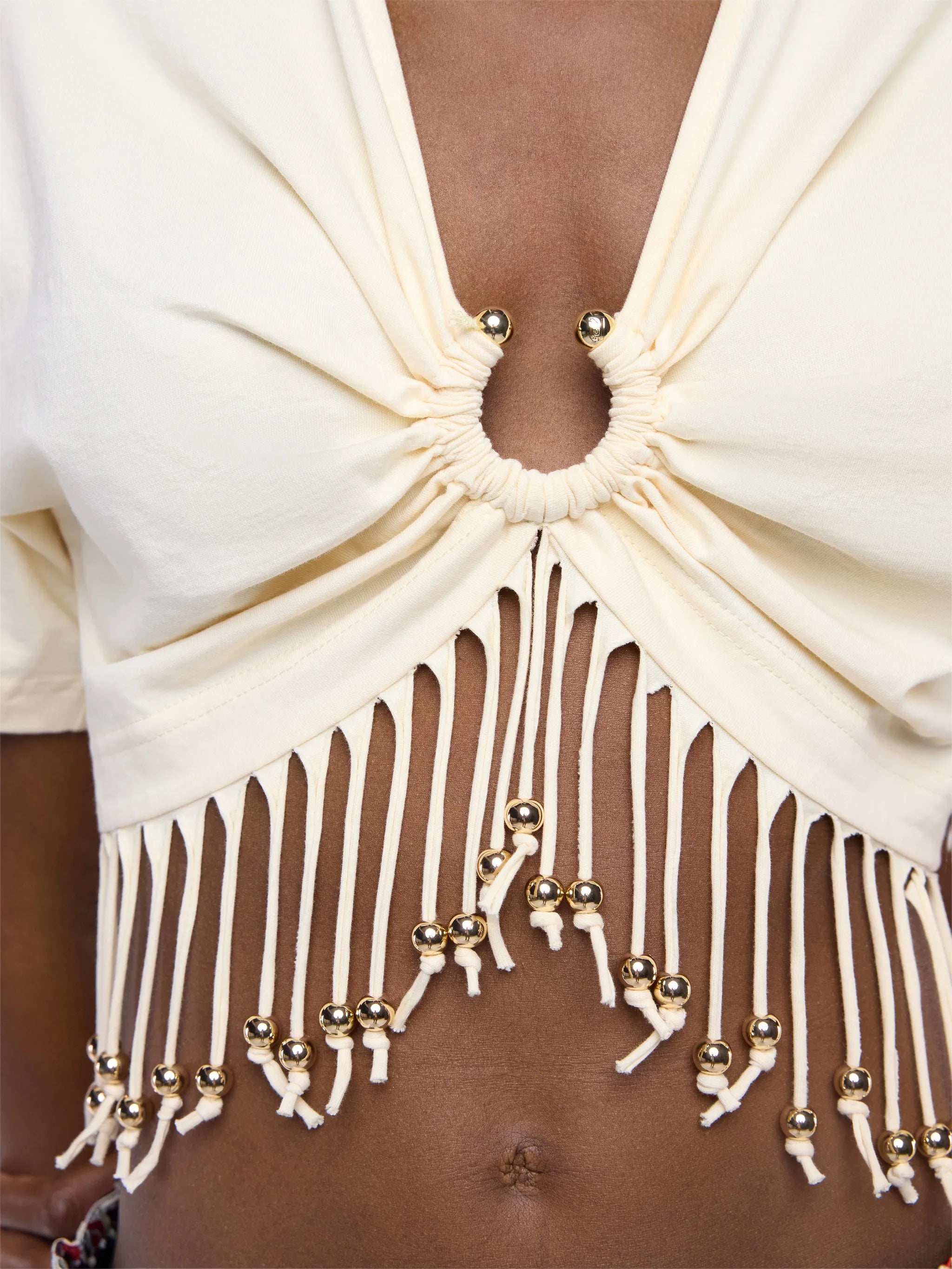 cotton crop top with beaded fringe details