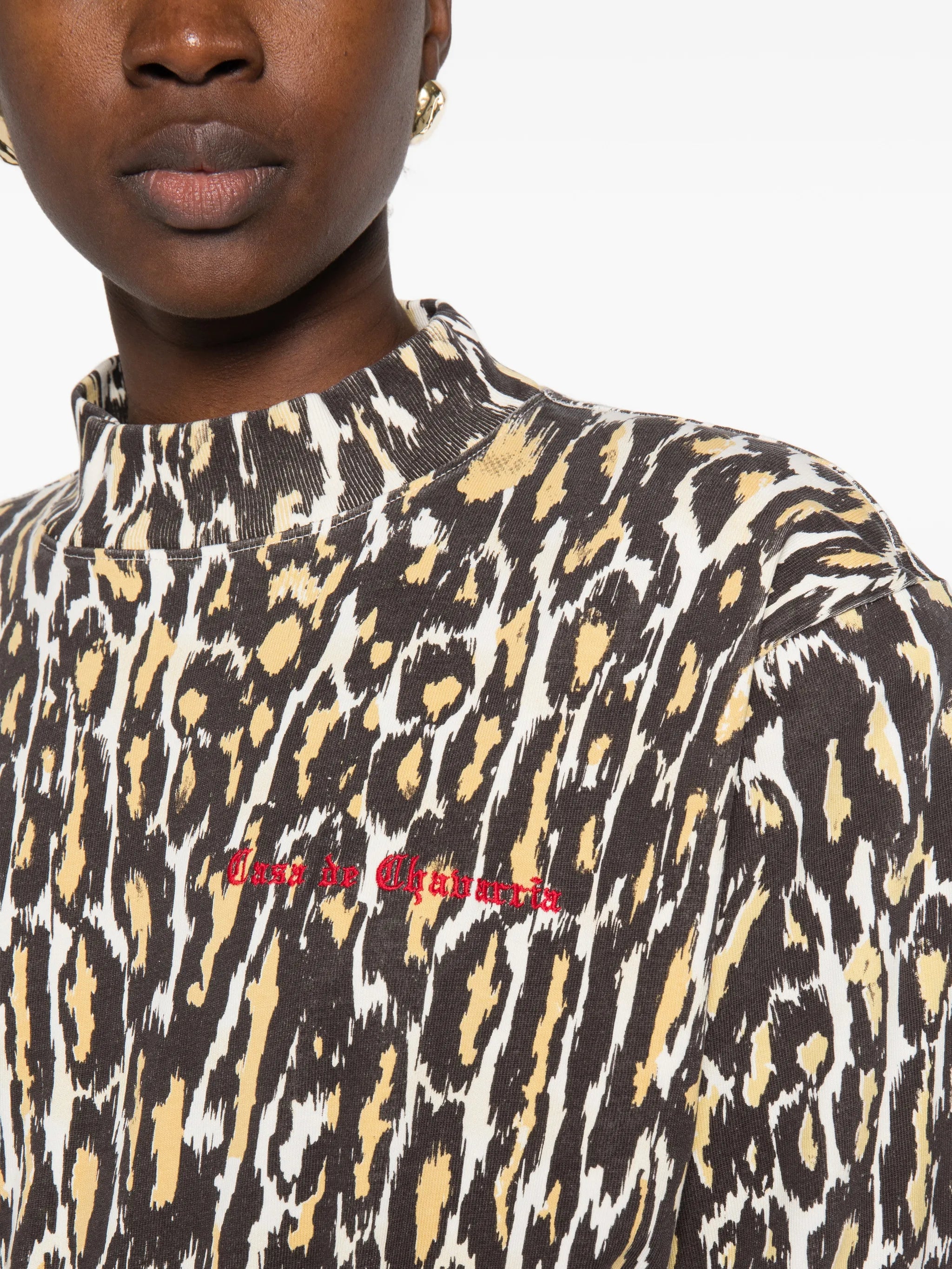 cheetah-print long-sleeved bodysuit