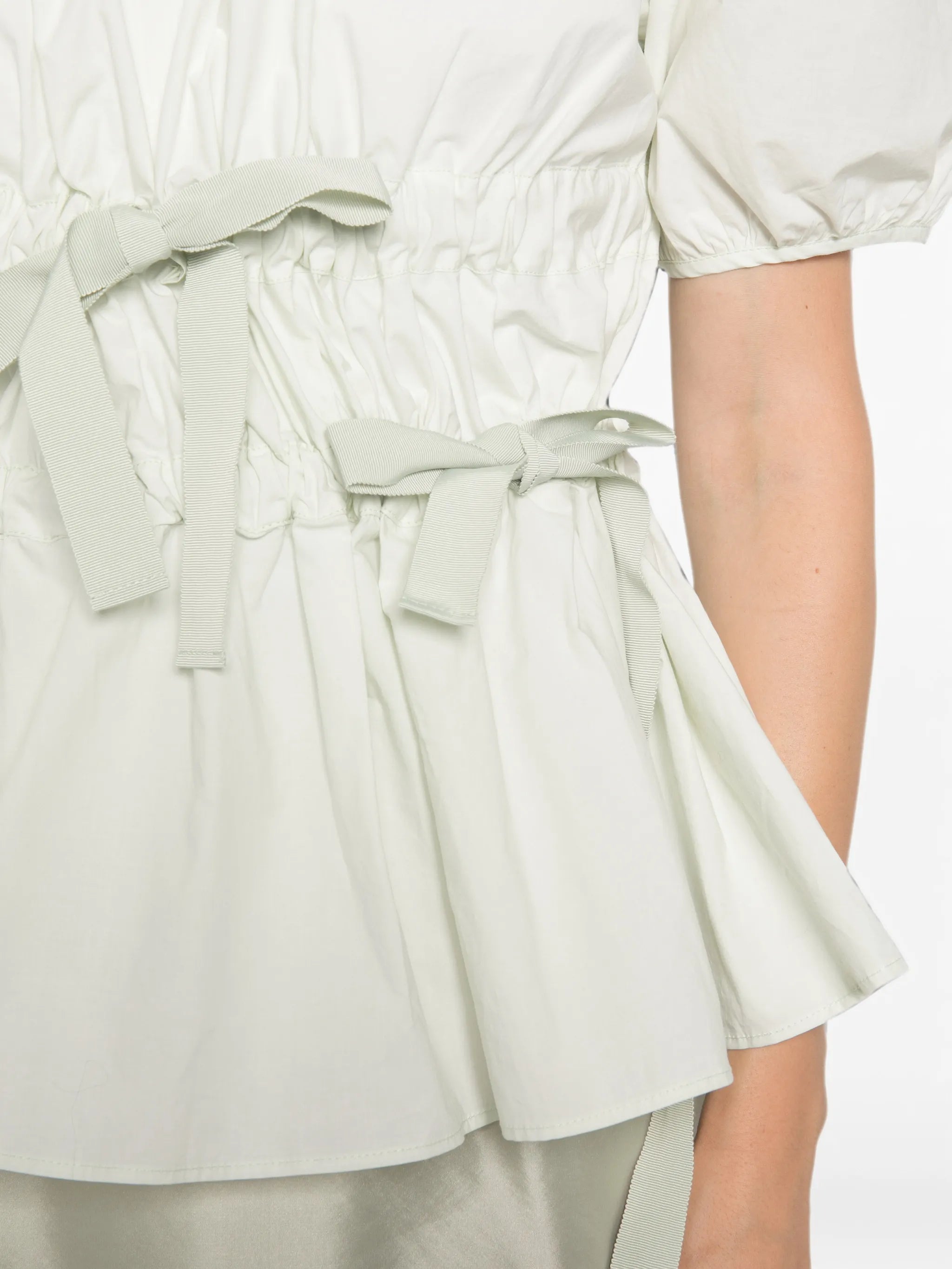 Papillon matelassé peplum top