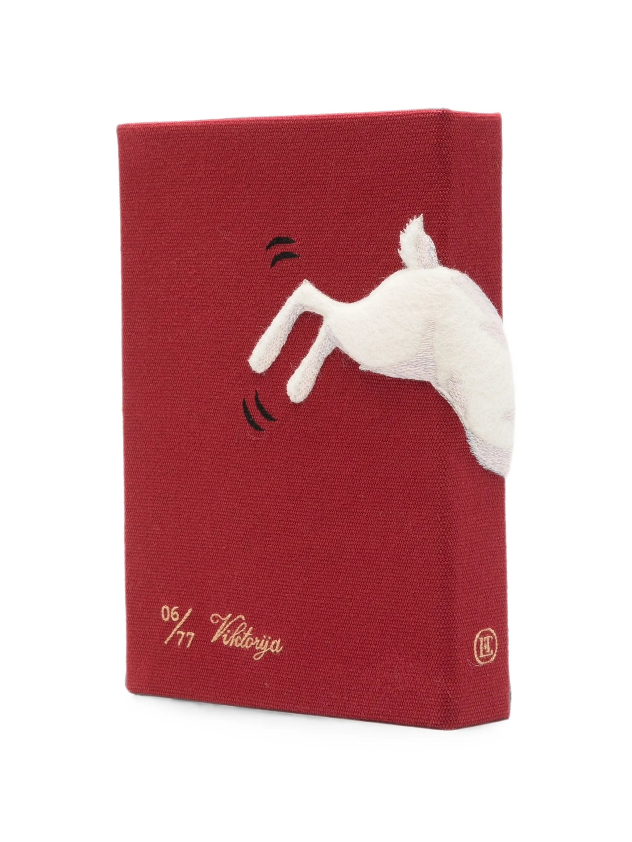 Down The Rabbit Hole clutch bag
