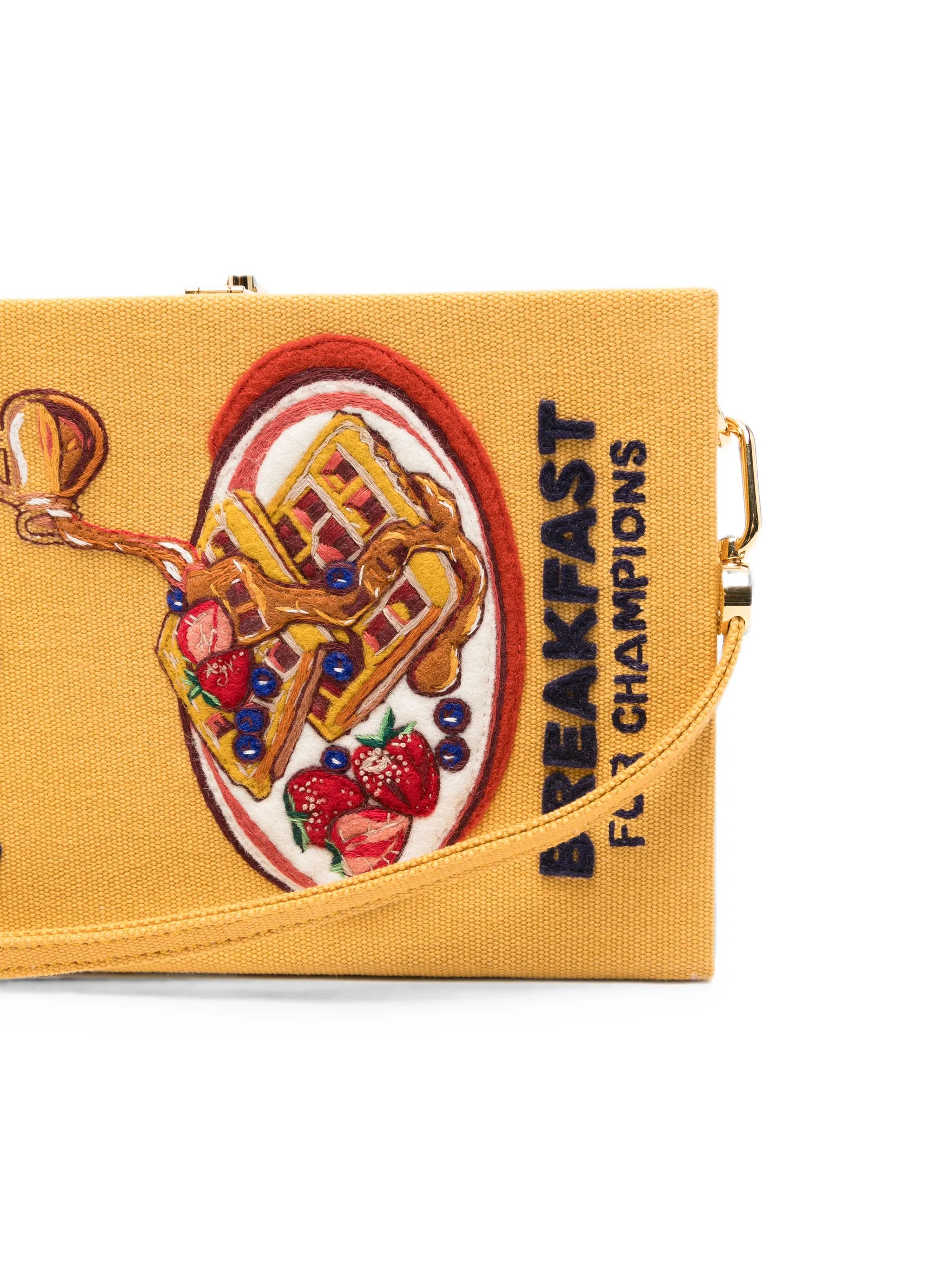 Waffles Breakfast For Champions embroidered clutch bag