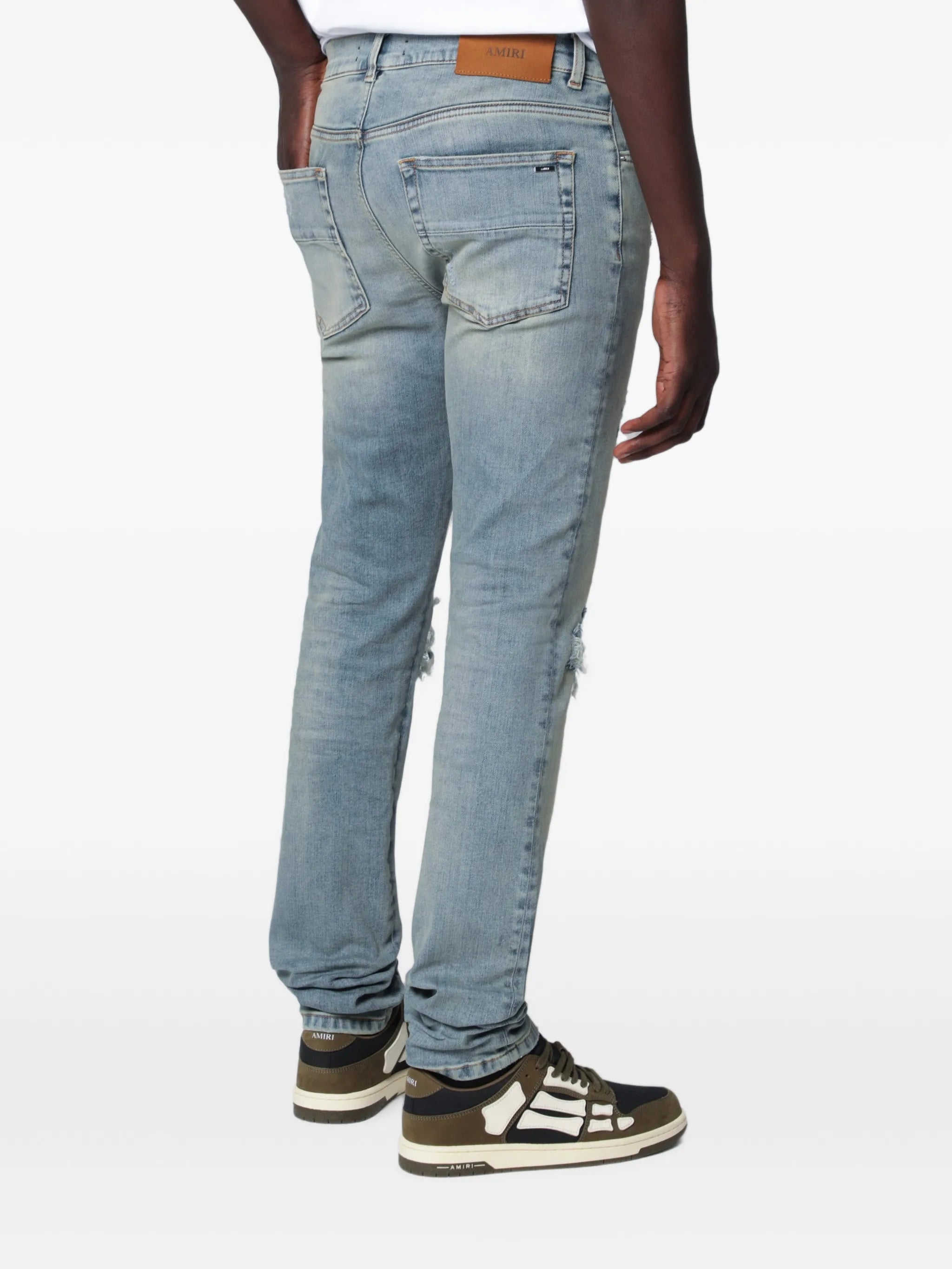 distressed-effect patched jeans