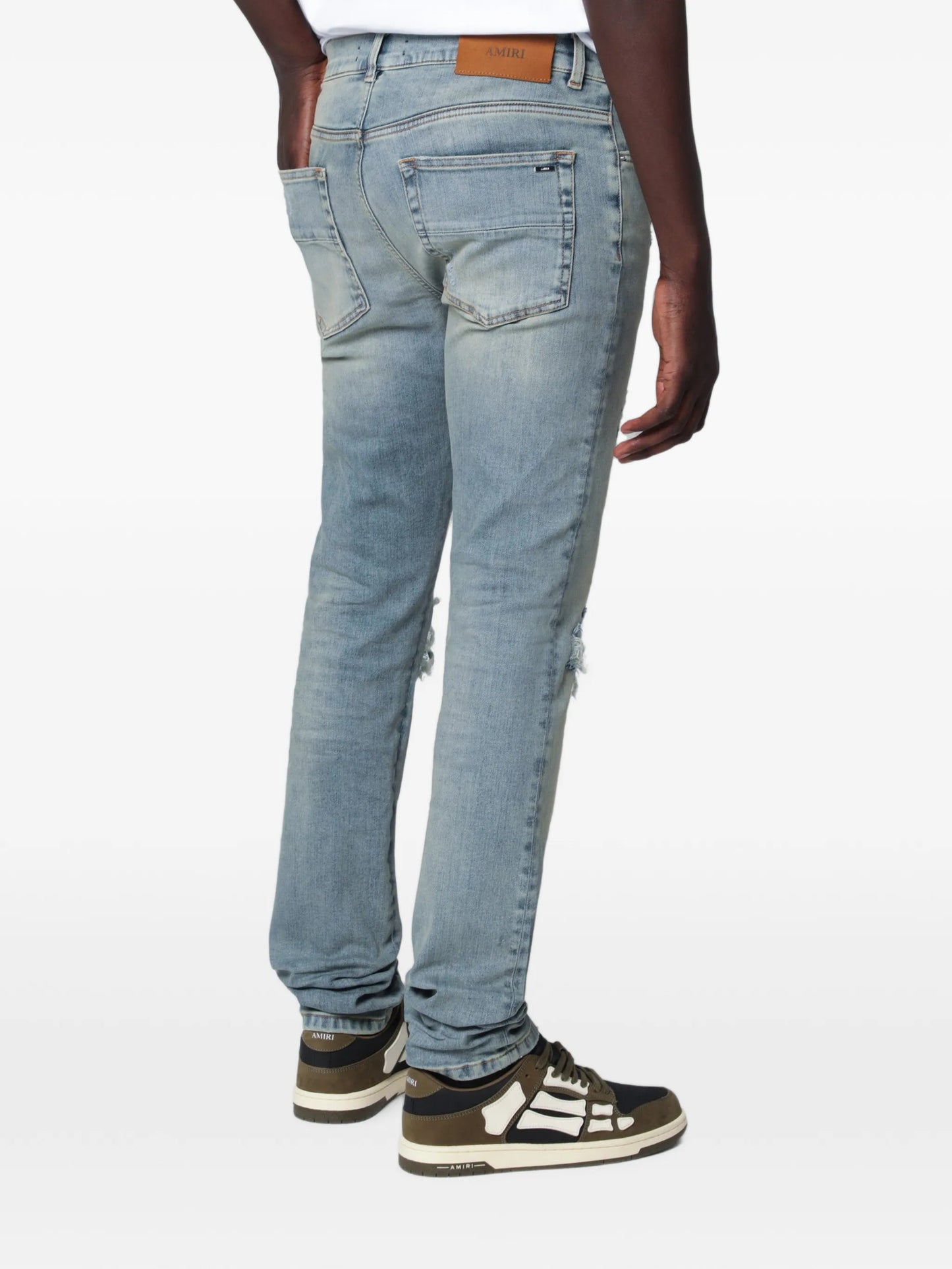 distressed-effect patched jeans