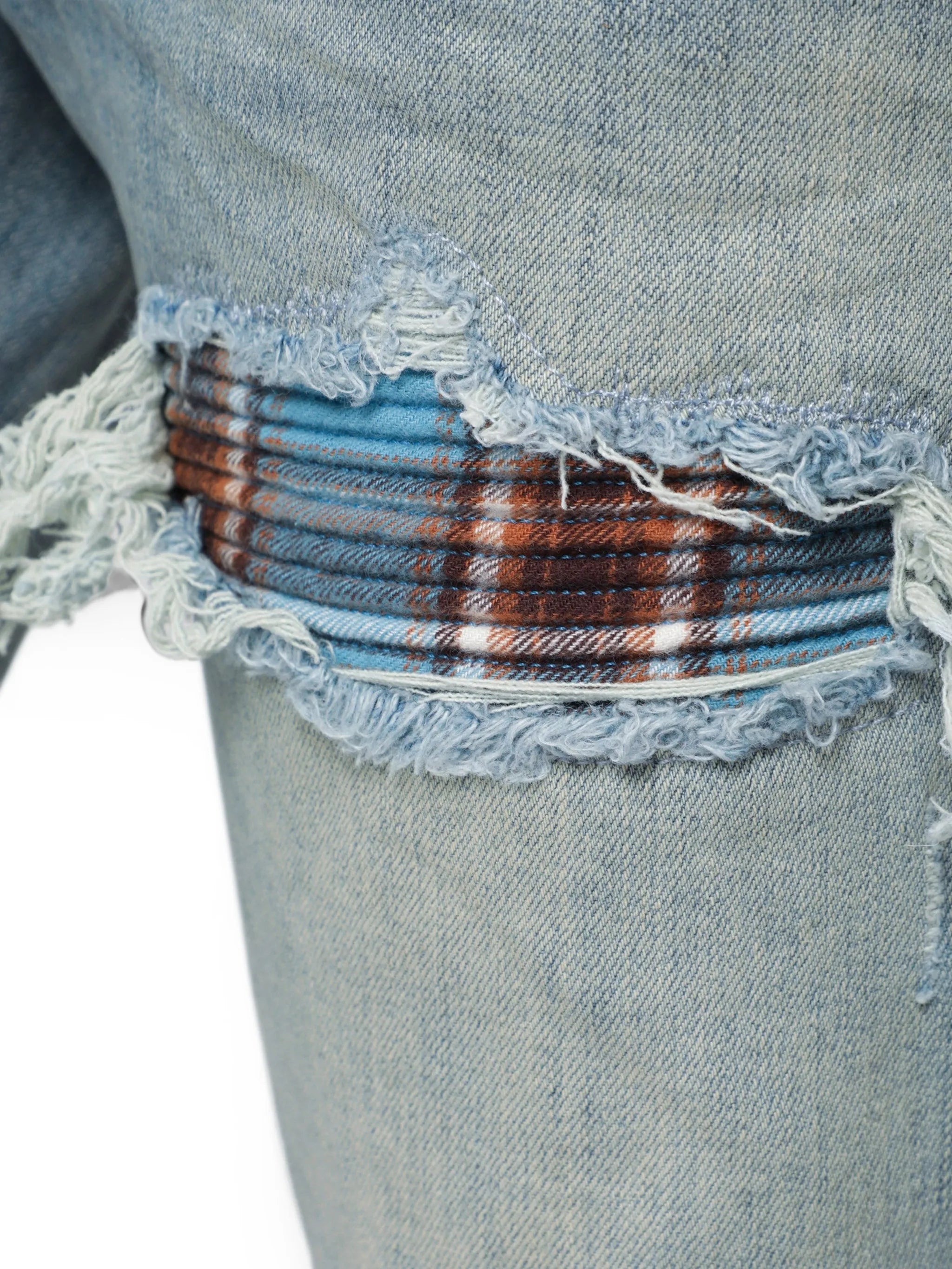 distressed-effect patched jeans