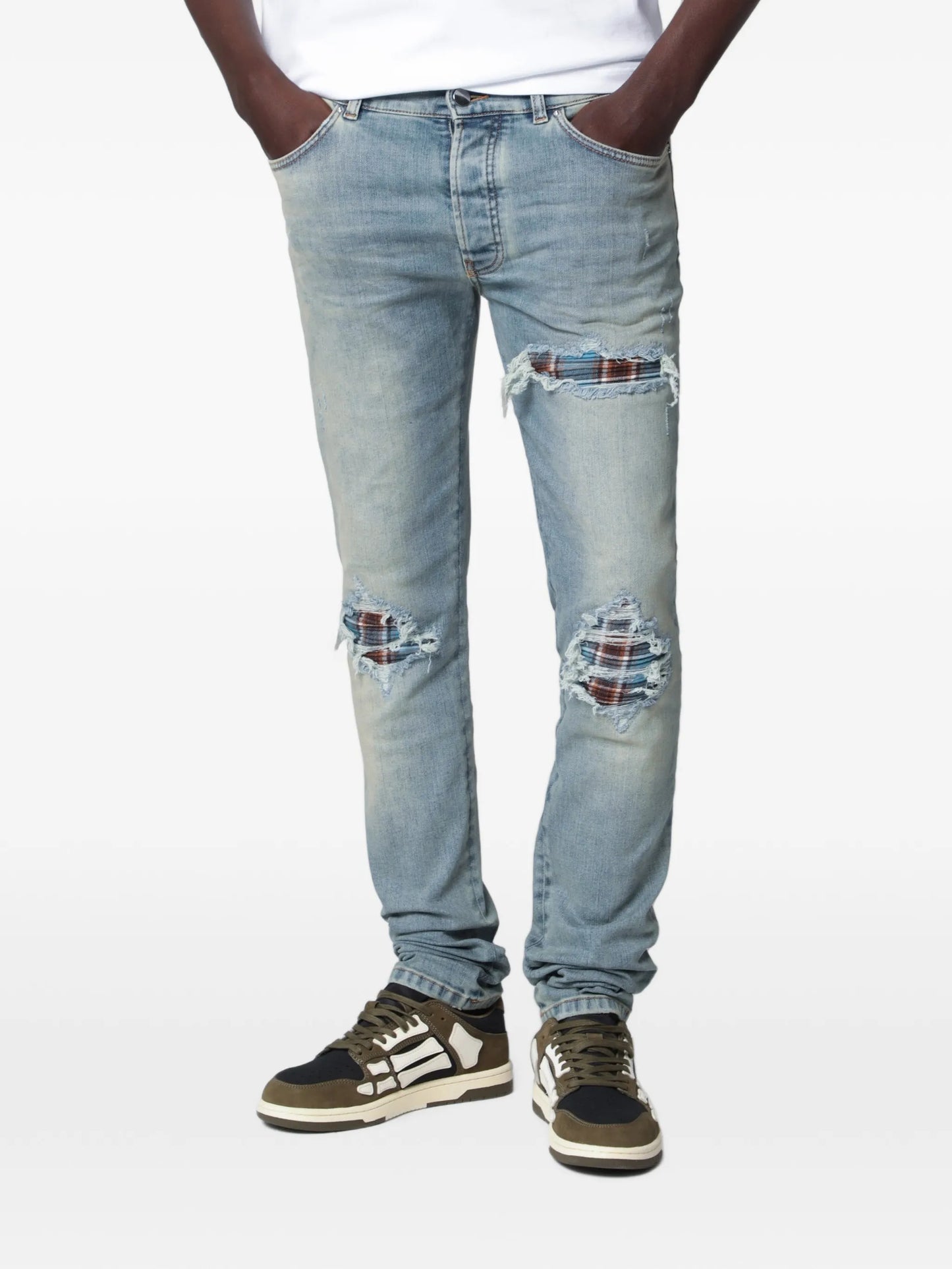 distressed-effect patched jeans