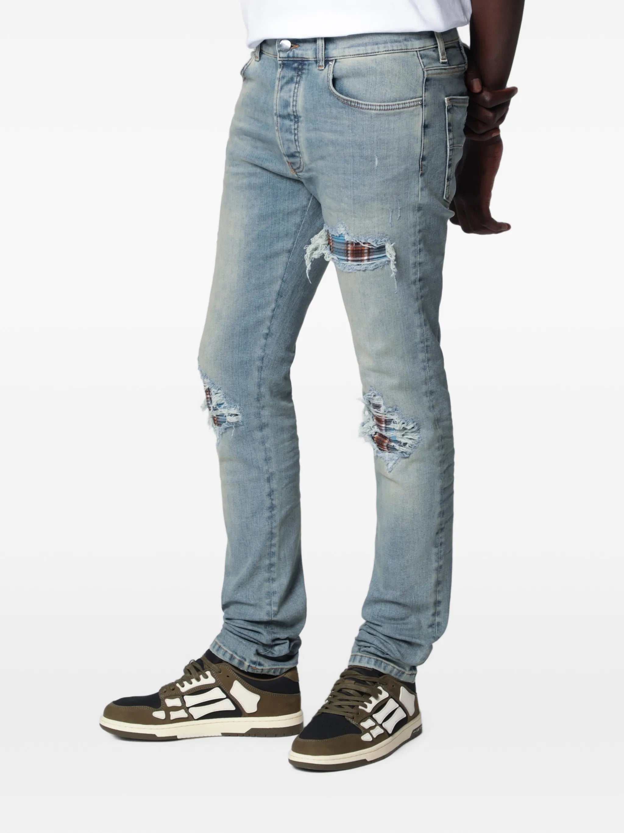 distressed-effect patched jeans