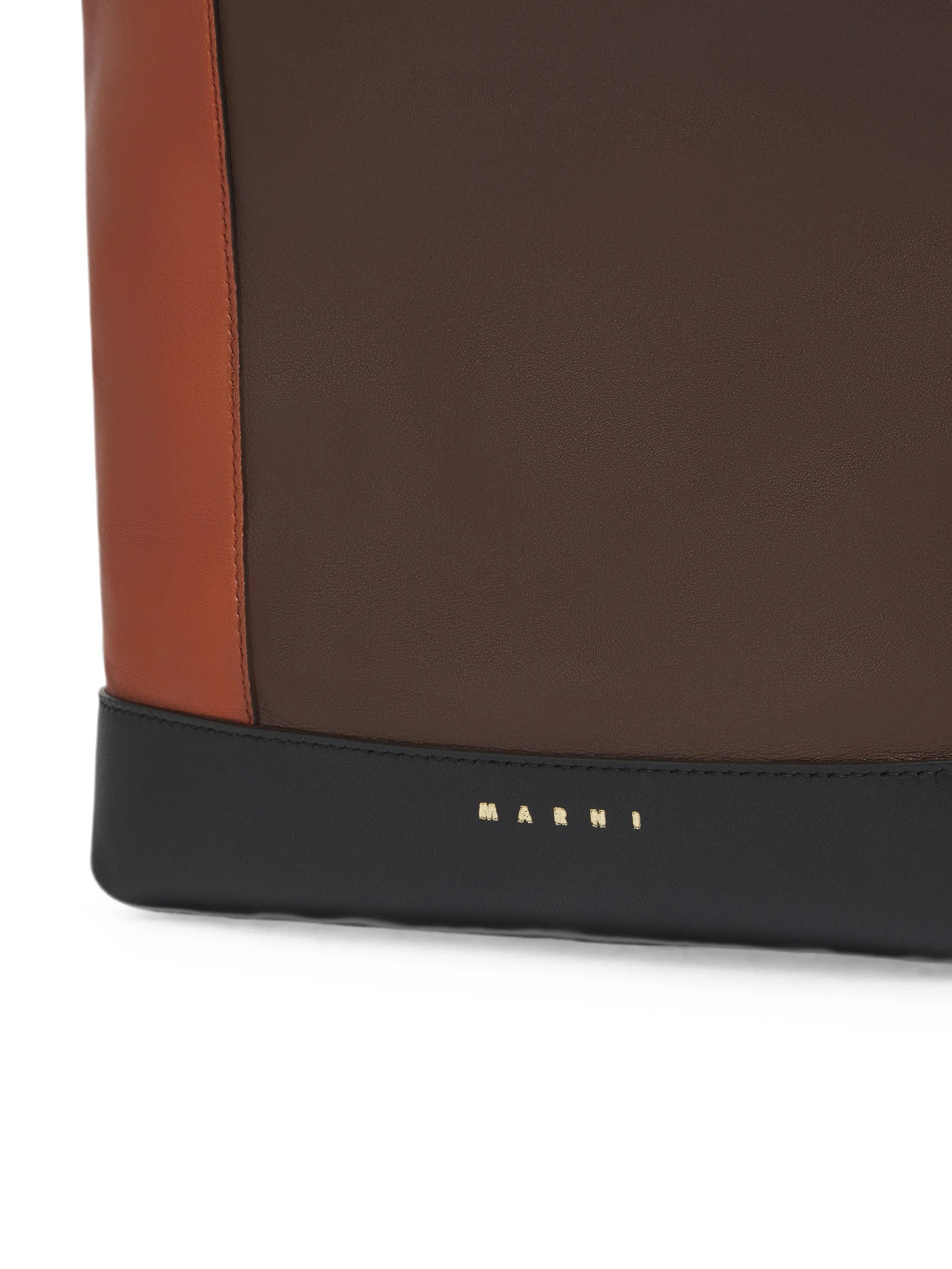 light brown, dark brown and black leather Pod 2.0 bag