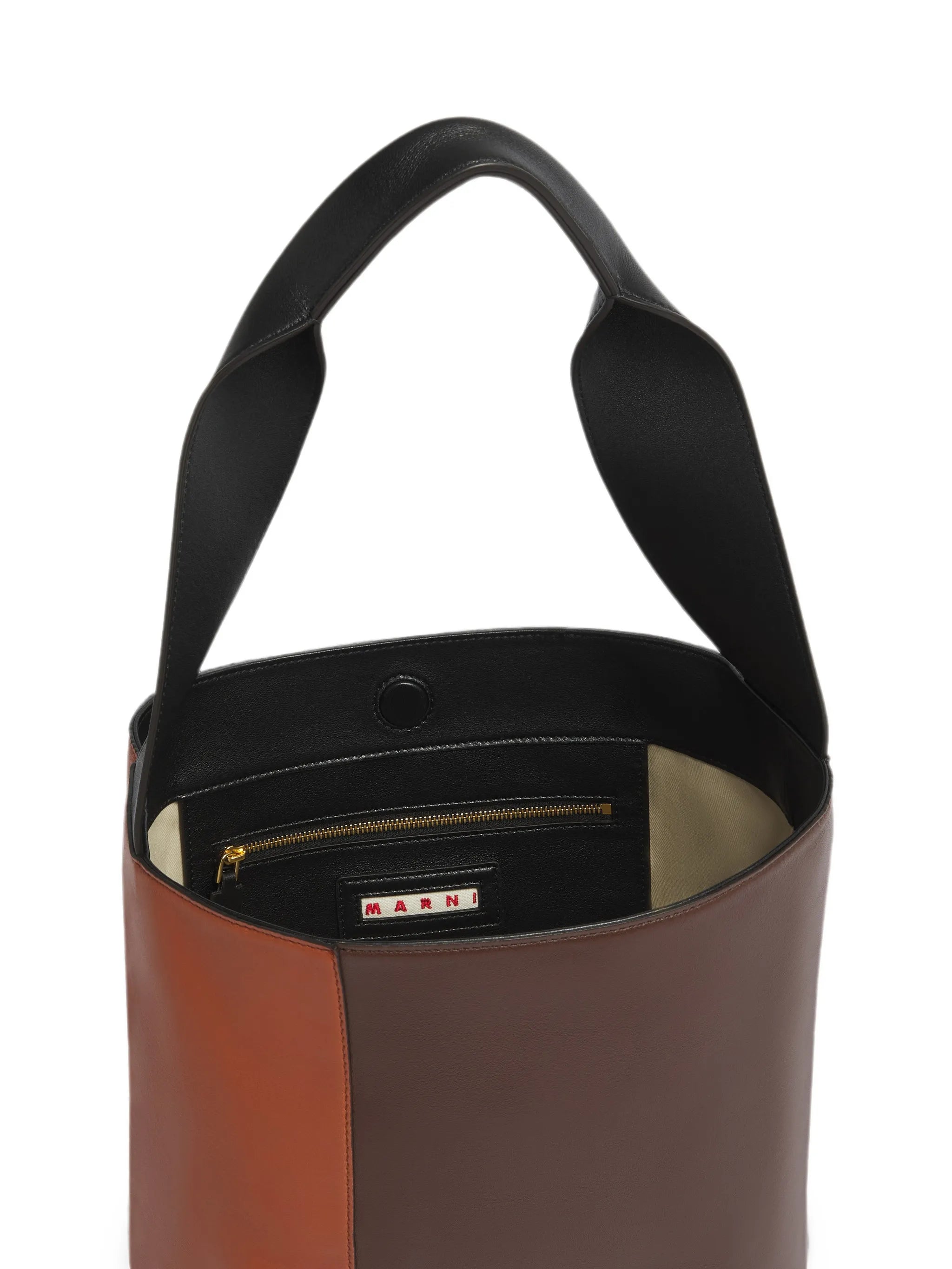 light brown, dark brown and black leather Pod 2.0 bag