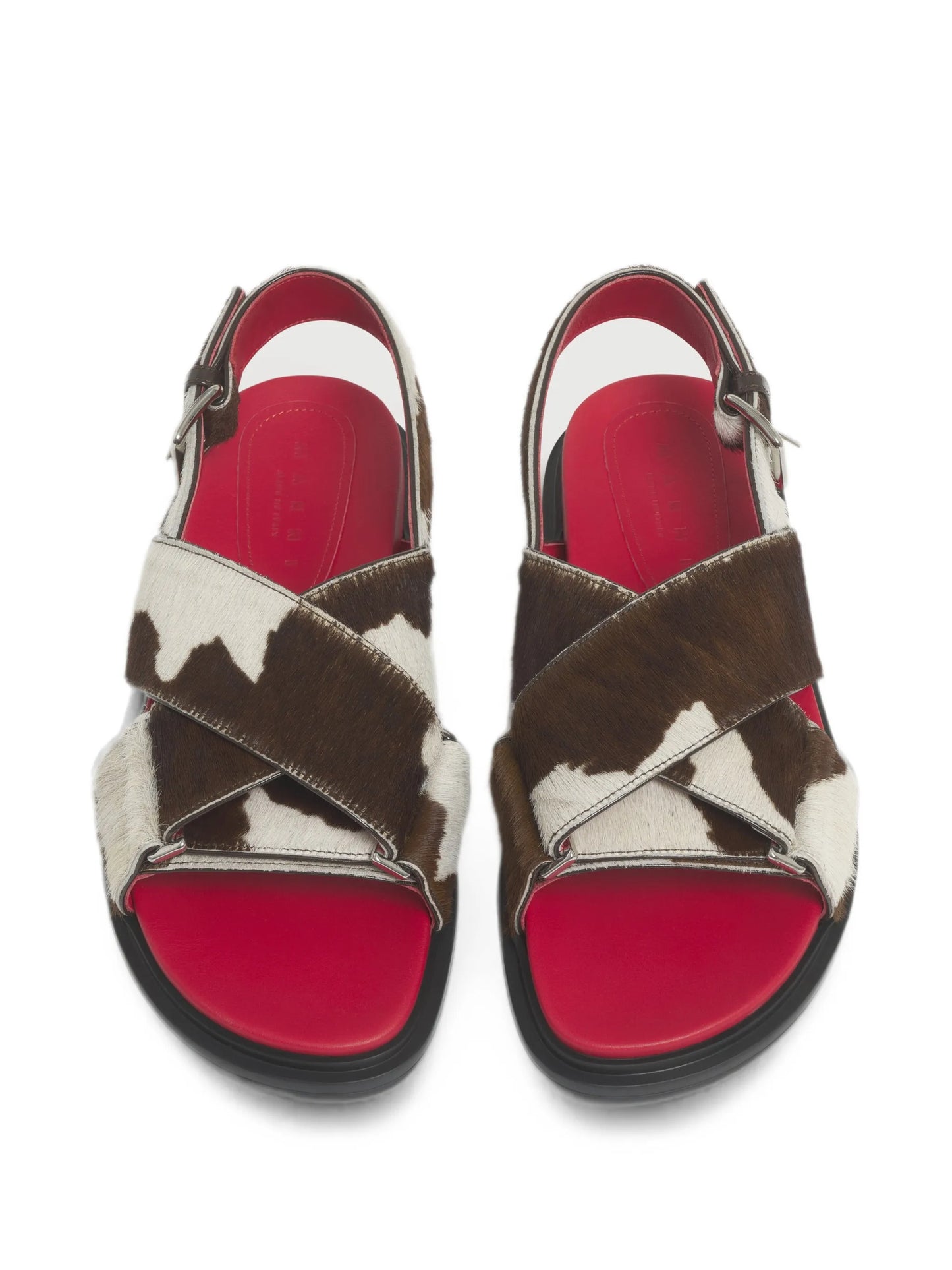 white and brown cow-print ponyhair Fussbett
