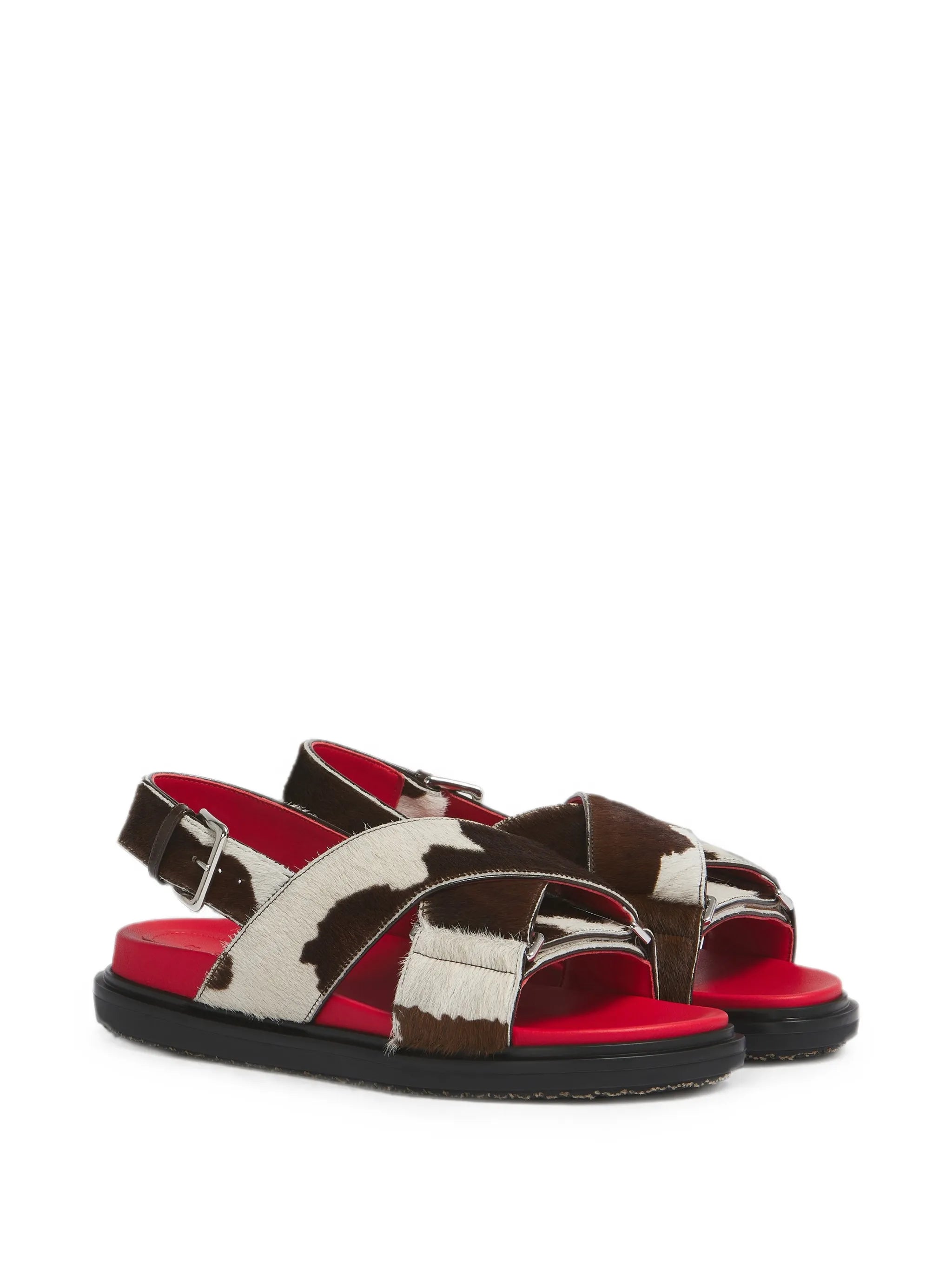white and brown cow-print ponyhair Fussbett