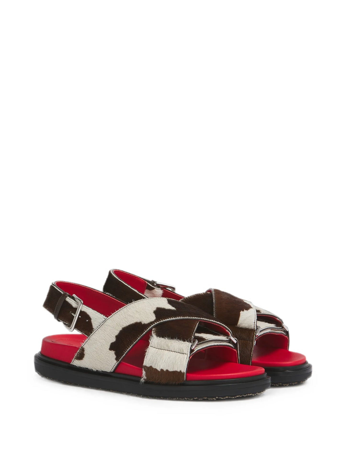 white and brown cow-print ponyhair Fussbett