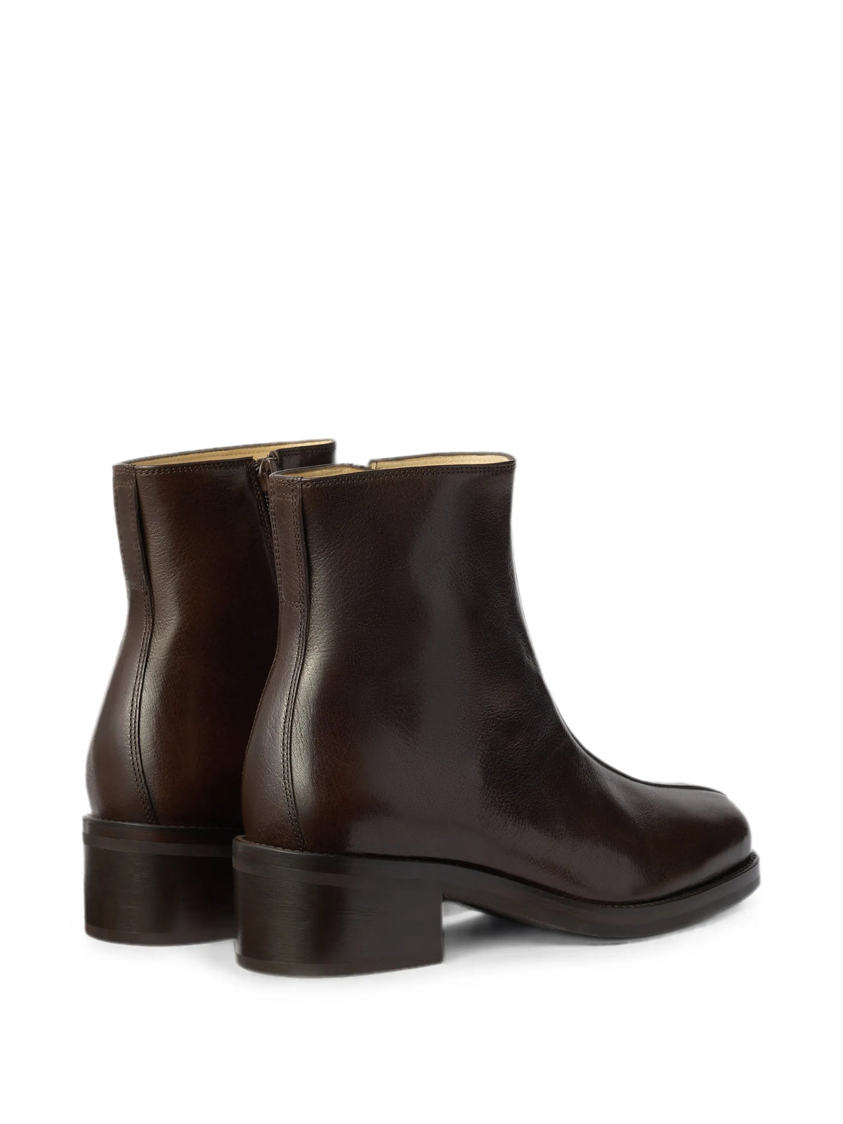 piped ankle boots in shiny buffalo leather