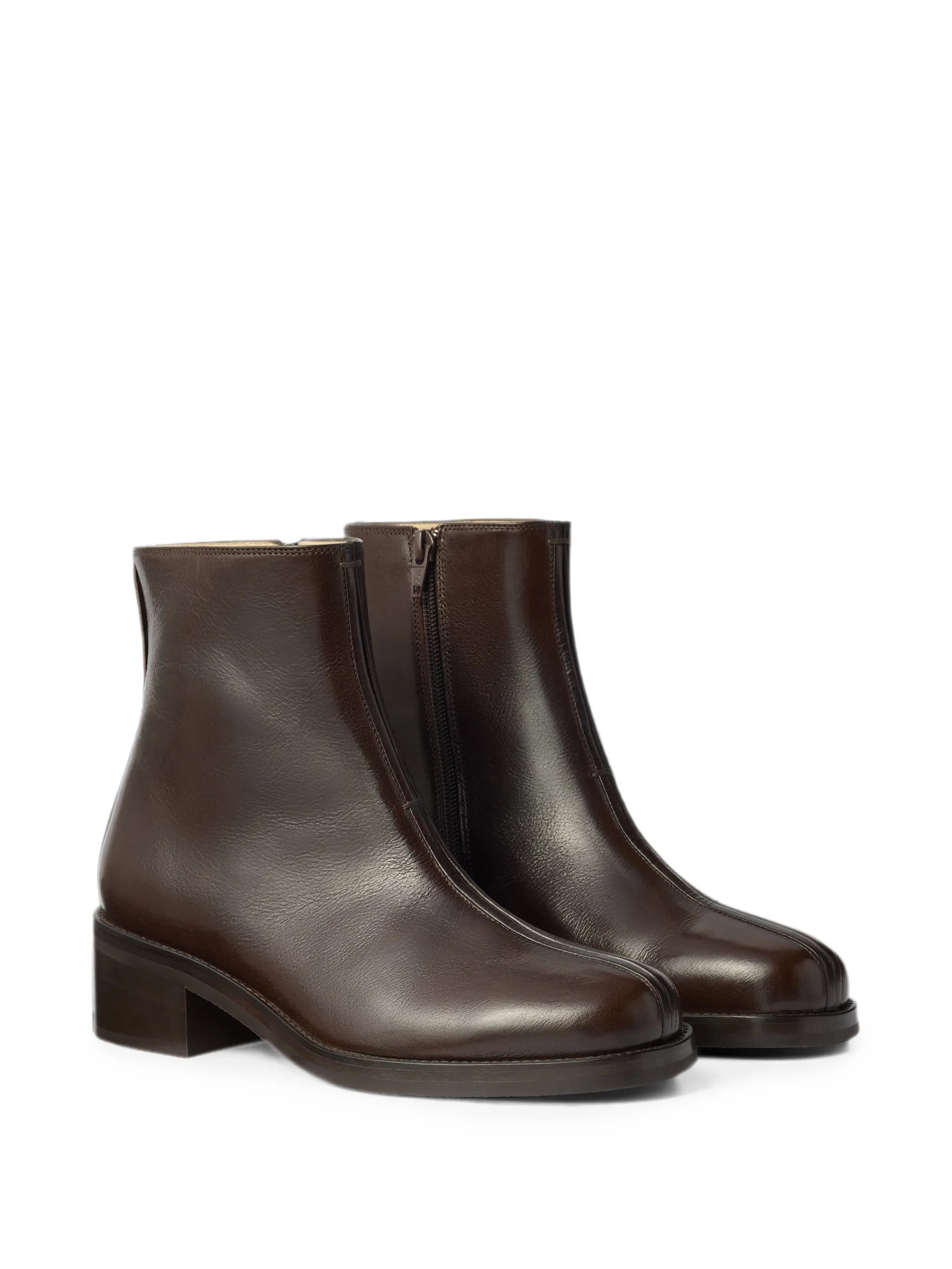 piped ankle boots in shiny buffalo leather
