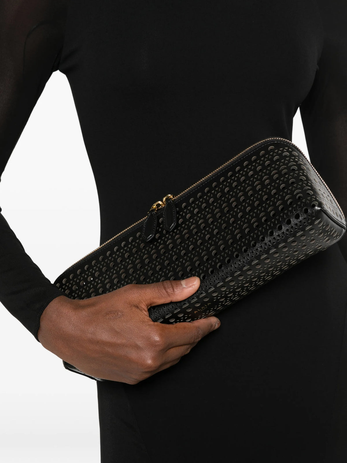 Delta laser-cut clutch bag