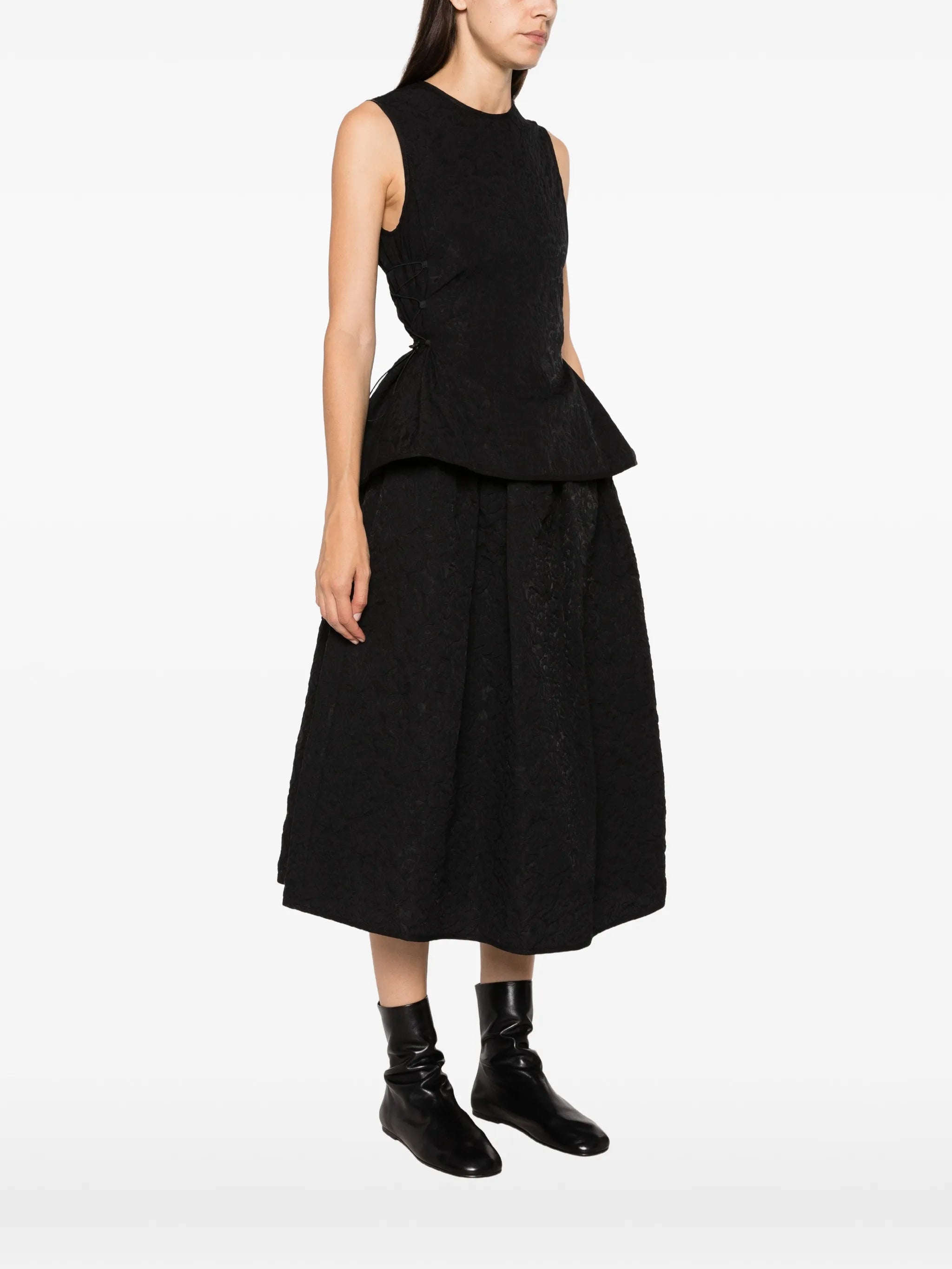 Fellen matelassé peplum top
