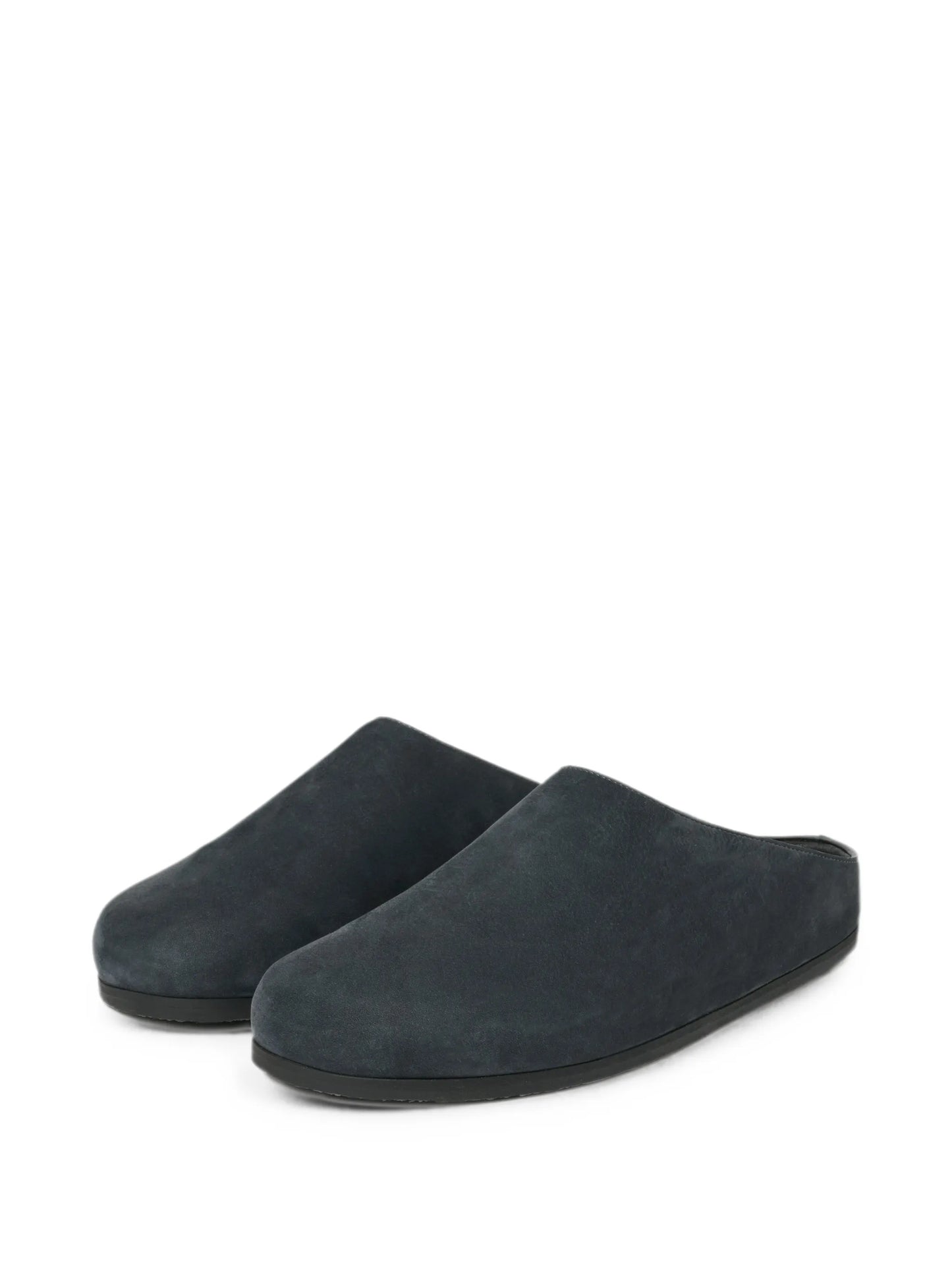 Wearing leather clogs