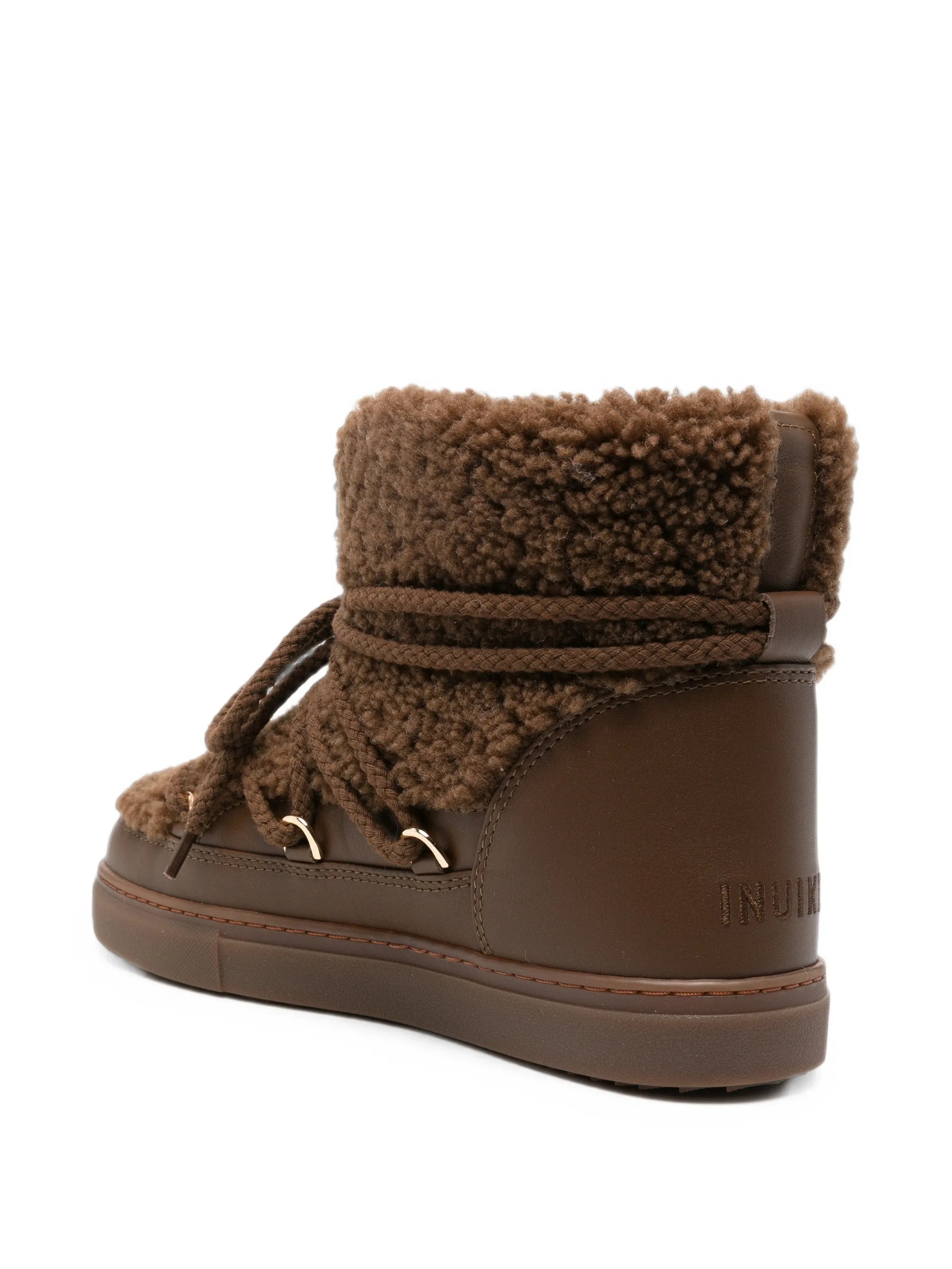 Curly ankle boots