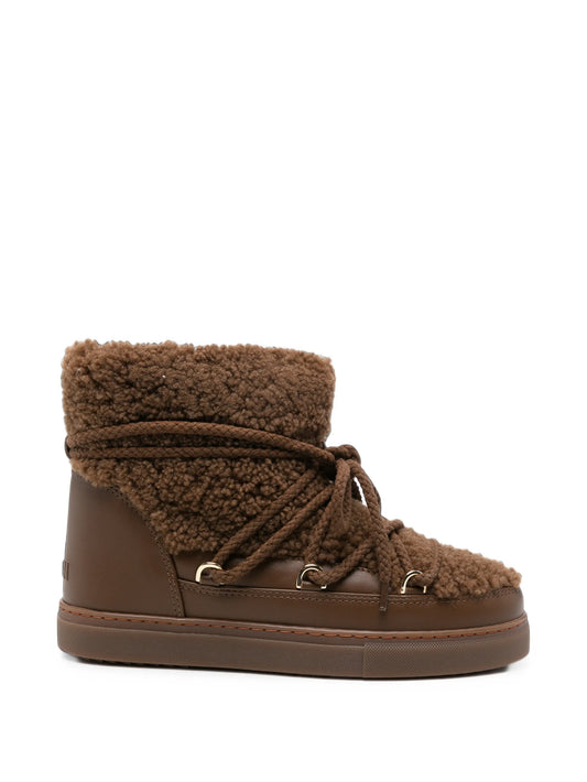 Curly ankle boots