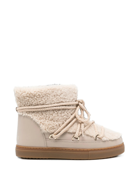 Curly ankle boots