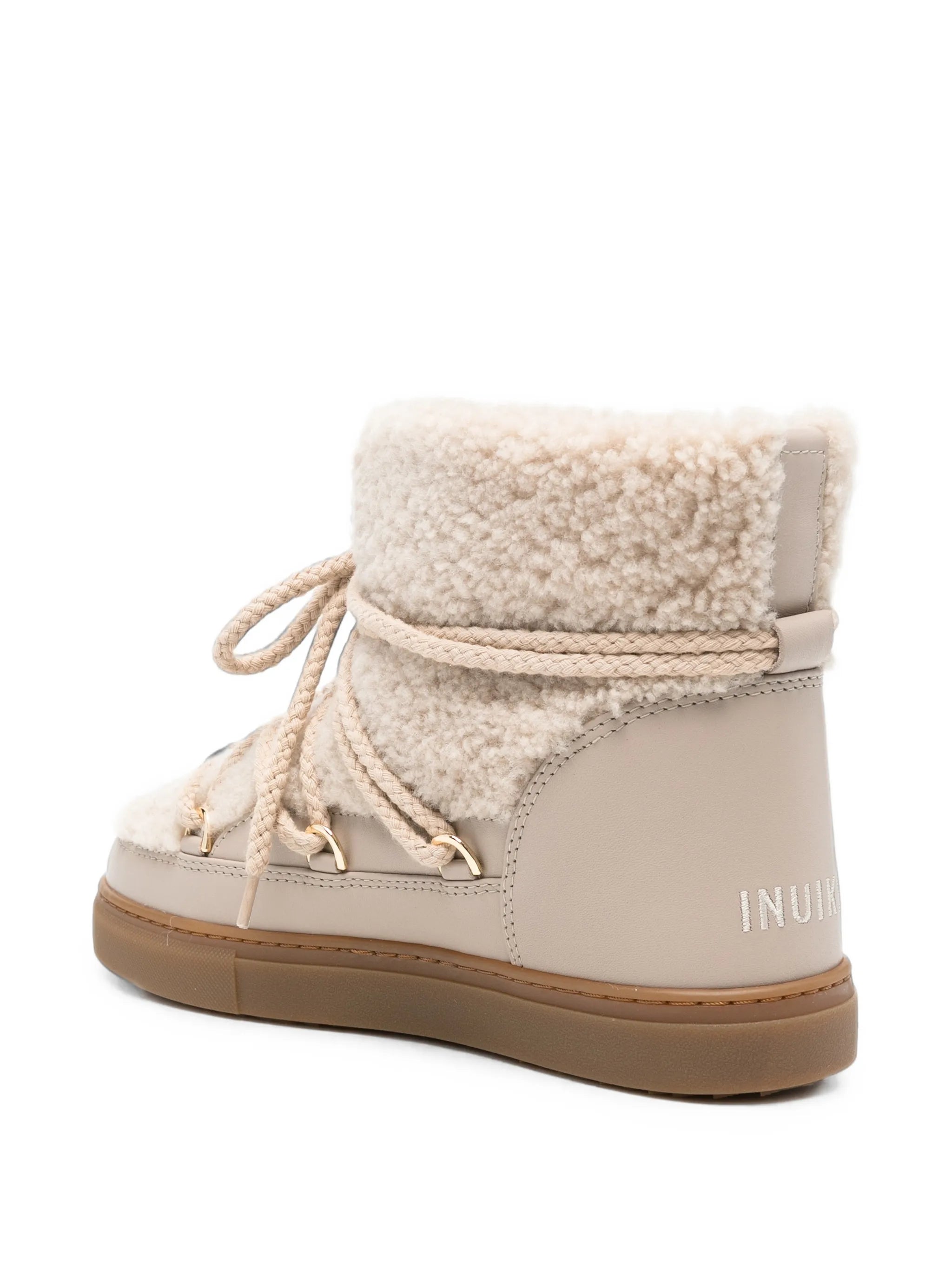 Curly ankle boots