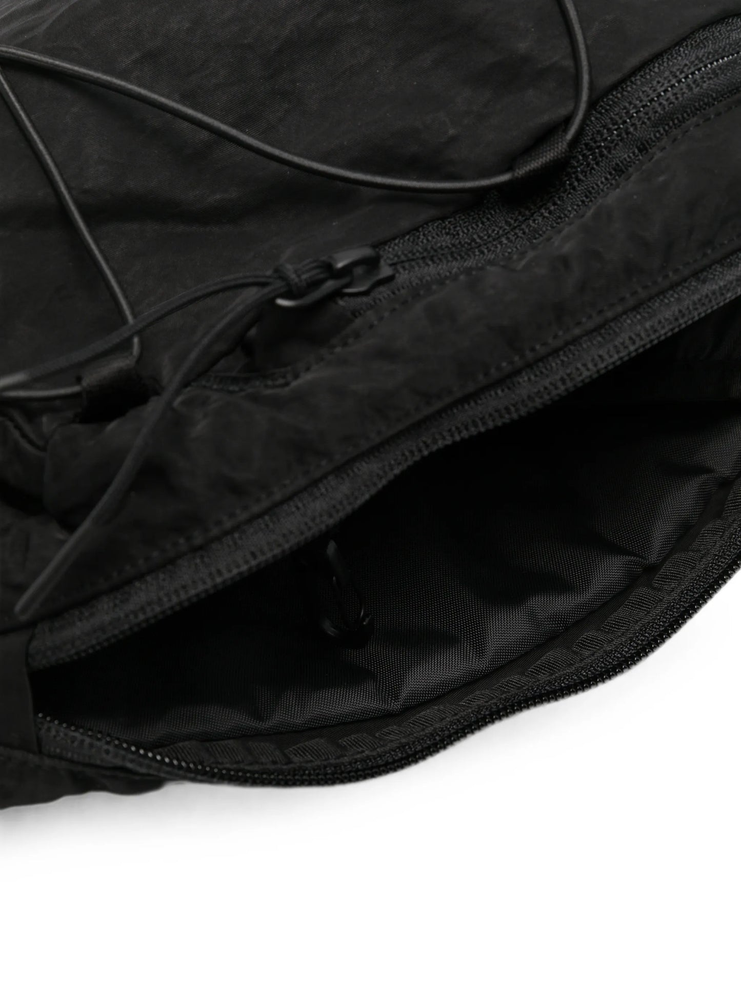 Lens-detail crossbody backpack
