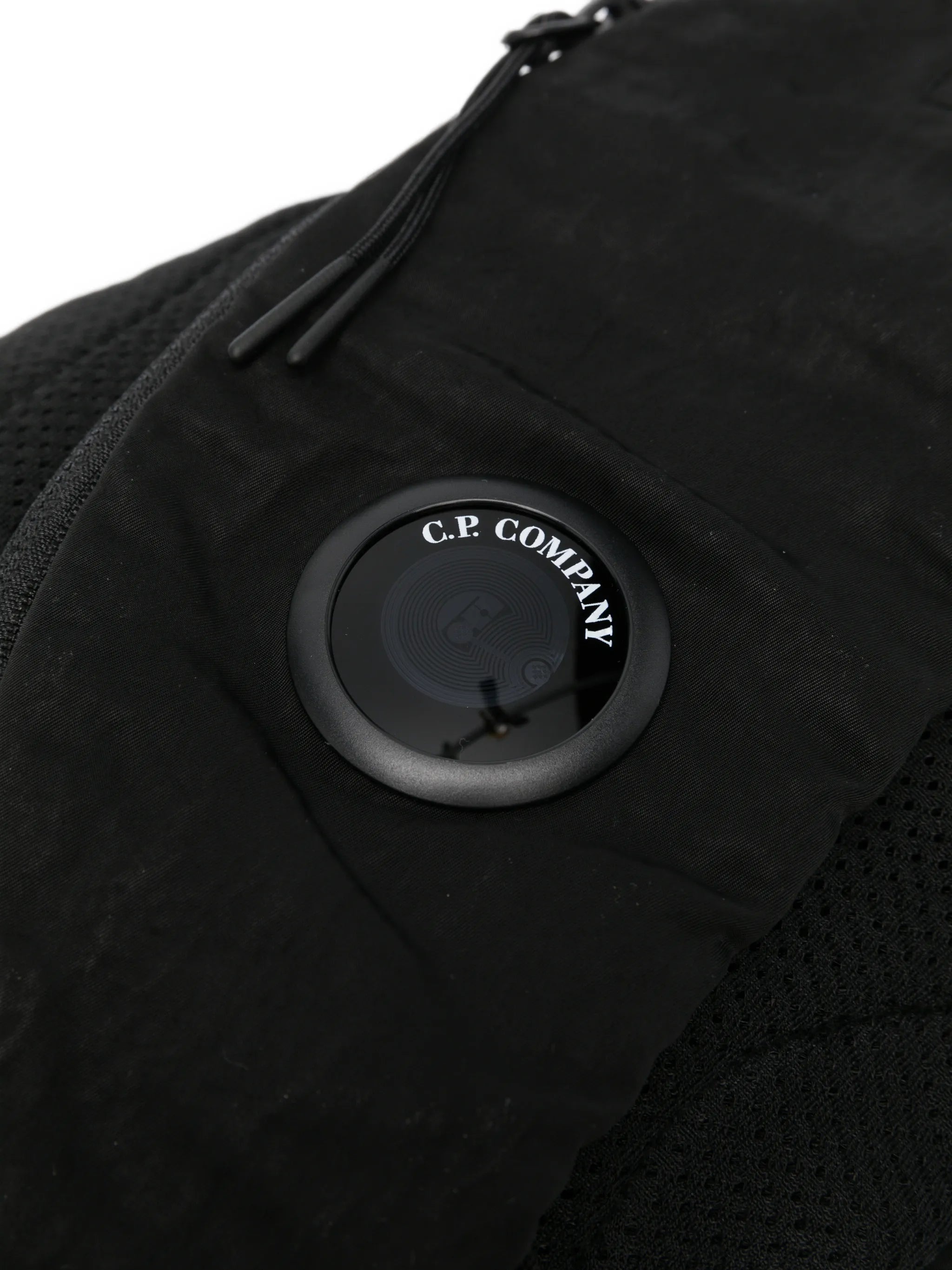 Lens-detail crossbody backpack
