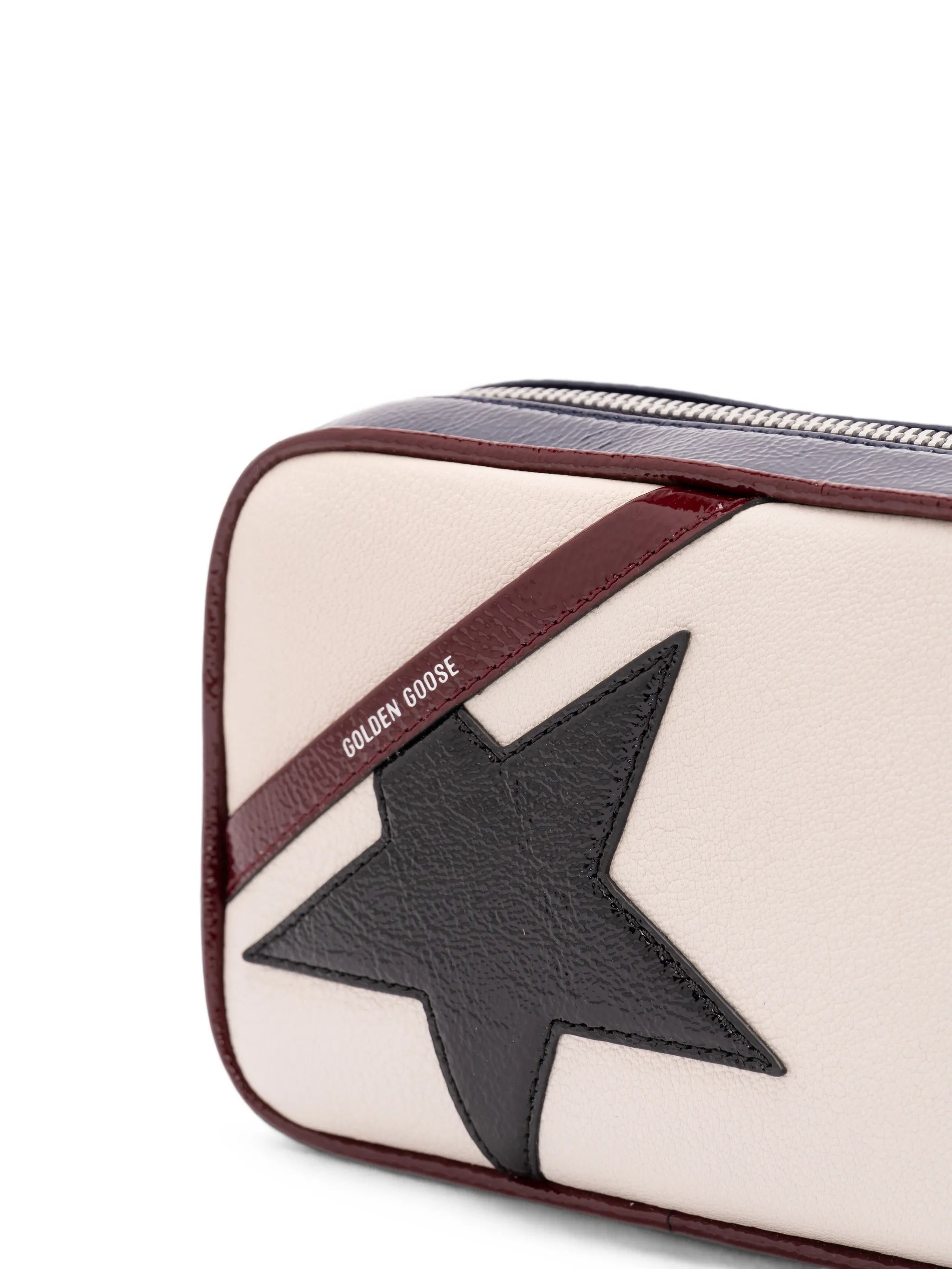mini Star bag in butter-white leather with black star and burgundy and dark blue details