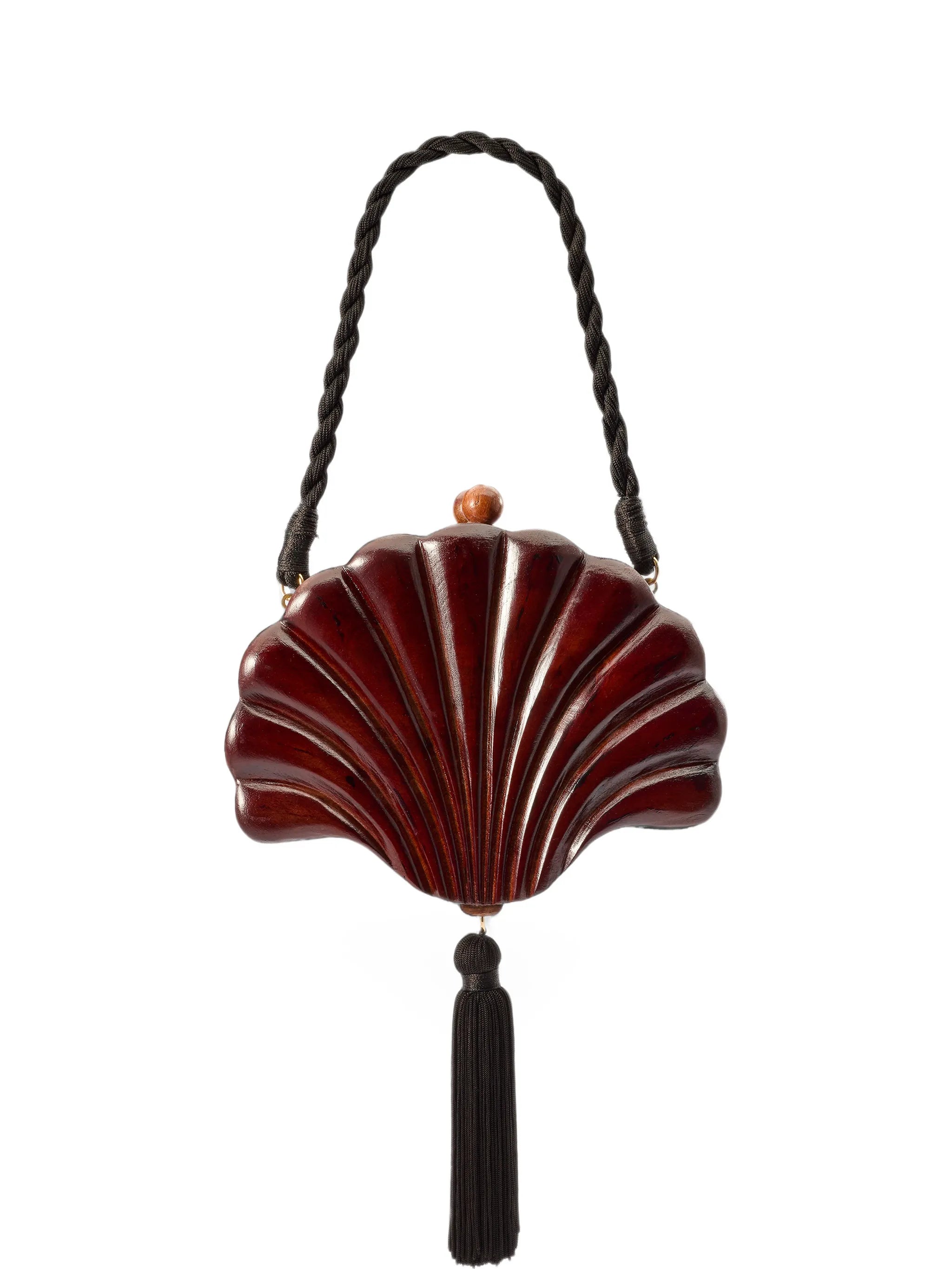 Concha carved clutch bag