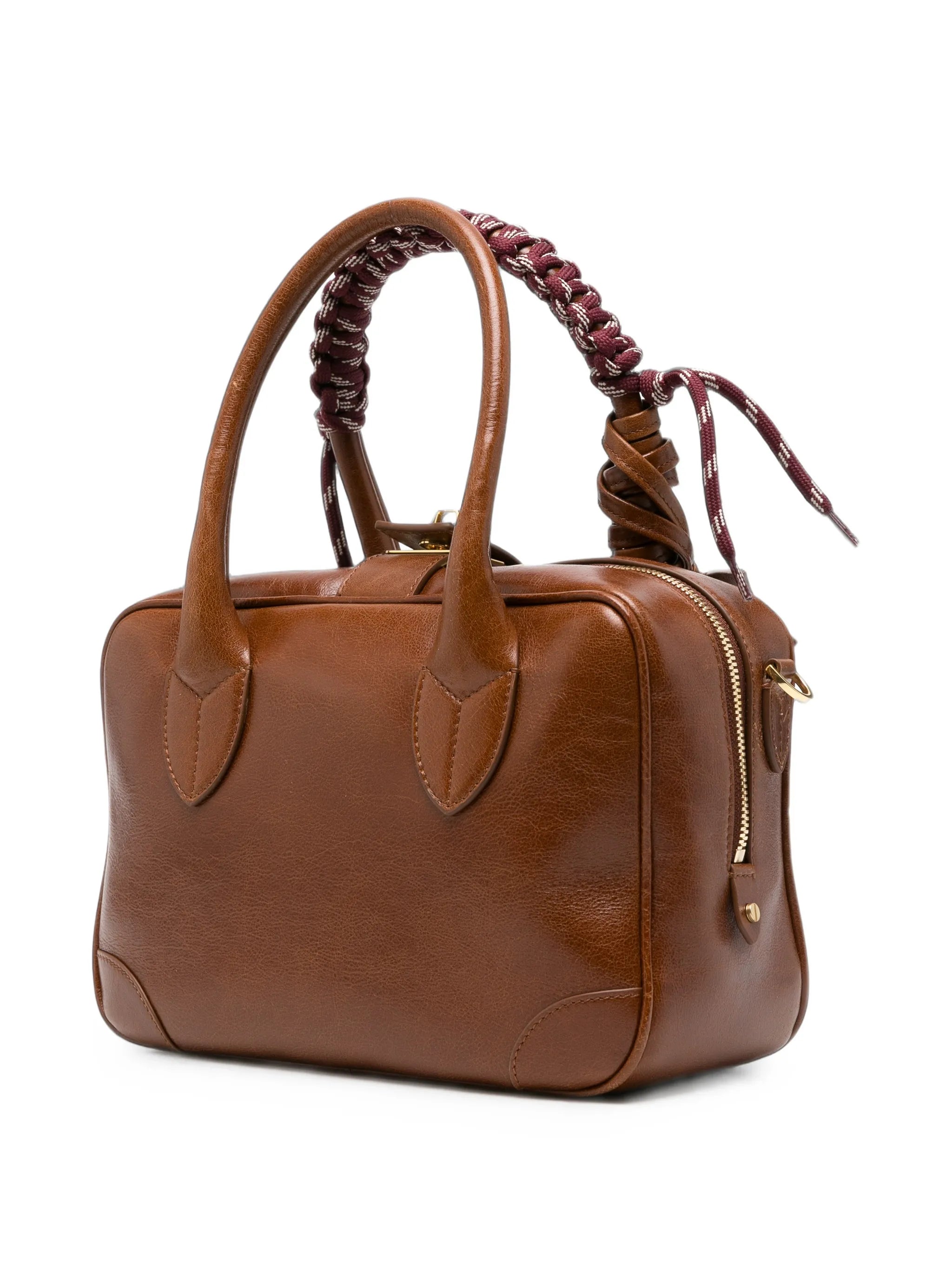 Vita bag in leather with charms and braided handle