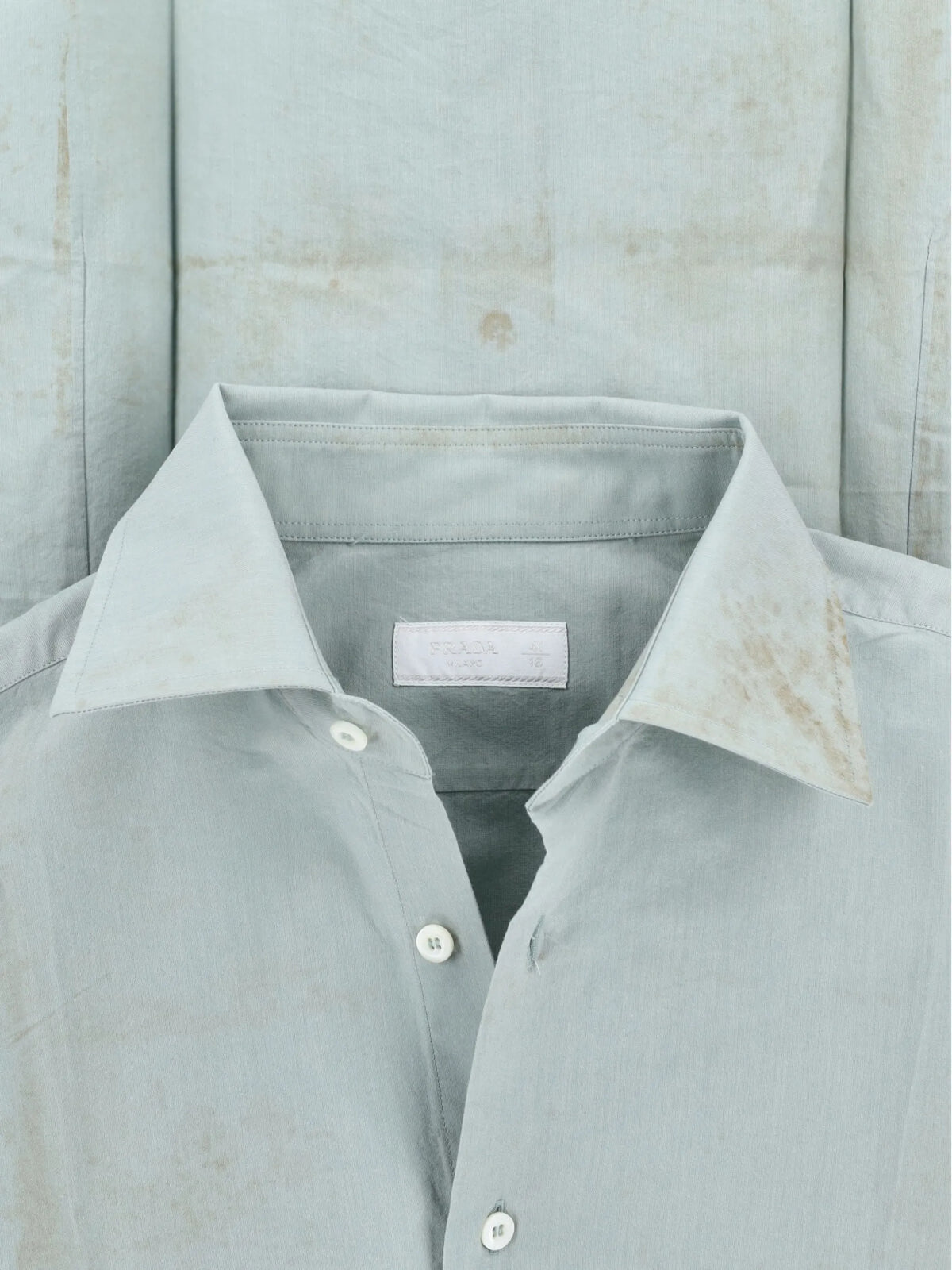 embroidered-logo striped-cuff shirt
